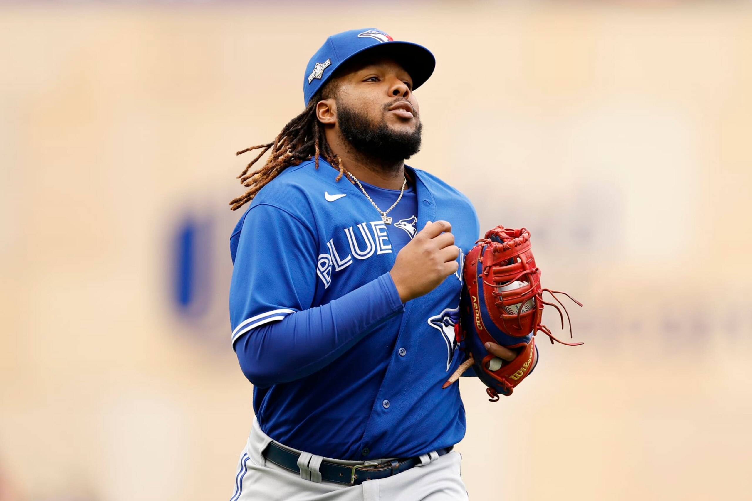 MINNEAPOLIS, MINNESOTA - OCTOBER 04: Vladimir Guerrero Jr. #27 of the Toronto Blue Jays takes the field against the Minnesota Twins during the first inning in Game Two of the Wild Card Series at Target Field on October 04, 2023 in Minneapolis, Minnesota. (Photo by David Berding/Getty Images)
