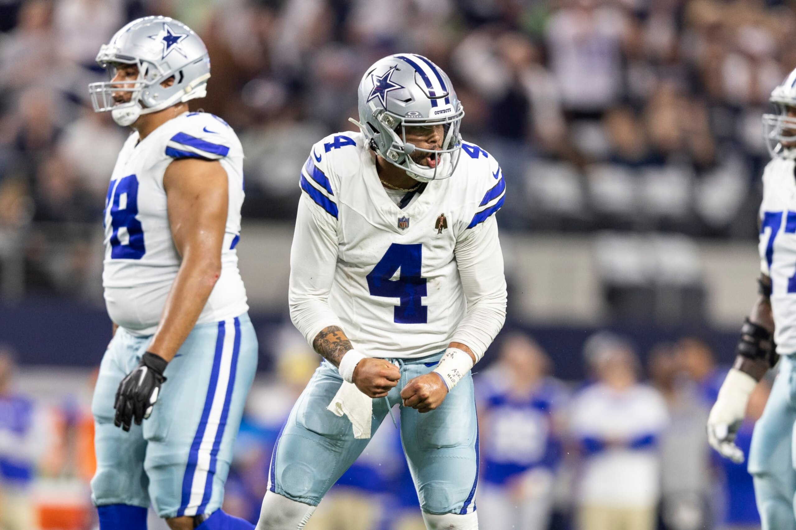 ARLINGTON, TEXAS - NOVEMBER 30: Dak Prescott #4 of the Dallas Cowboys celebrates after a touchdown during an NFL football game between the Dallas Cowboys and the Seattle Seahawks at AT&T Stadium on November 30, 2023 in Arlington, Texas. (Photo by Michael Owens/Getty Images)