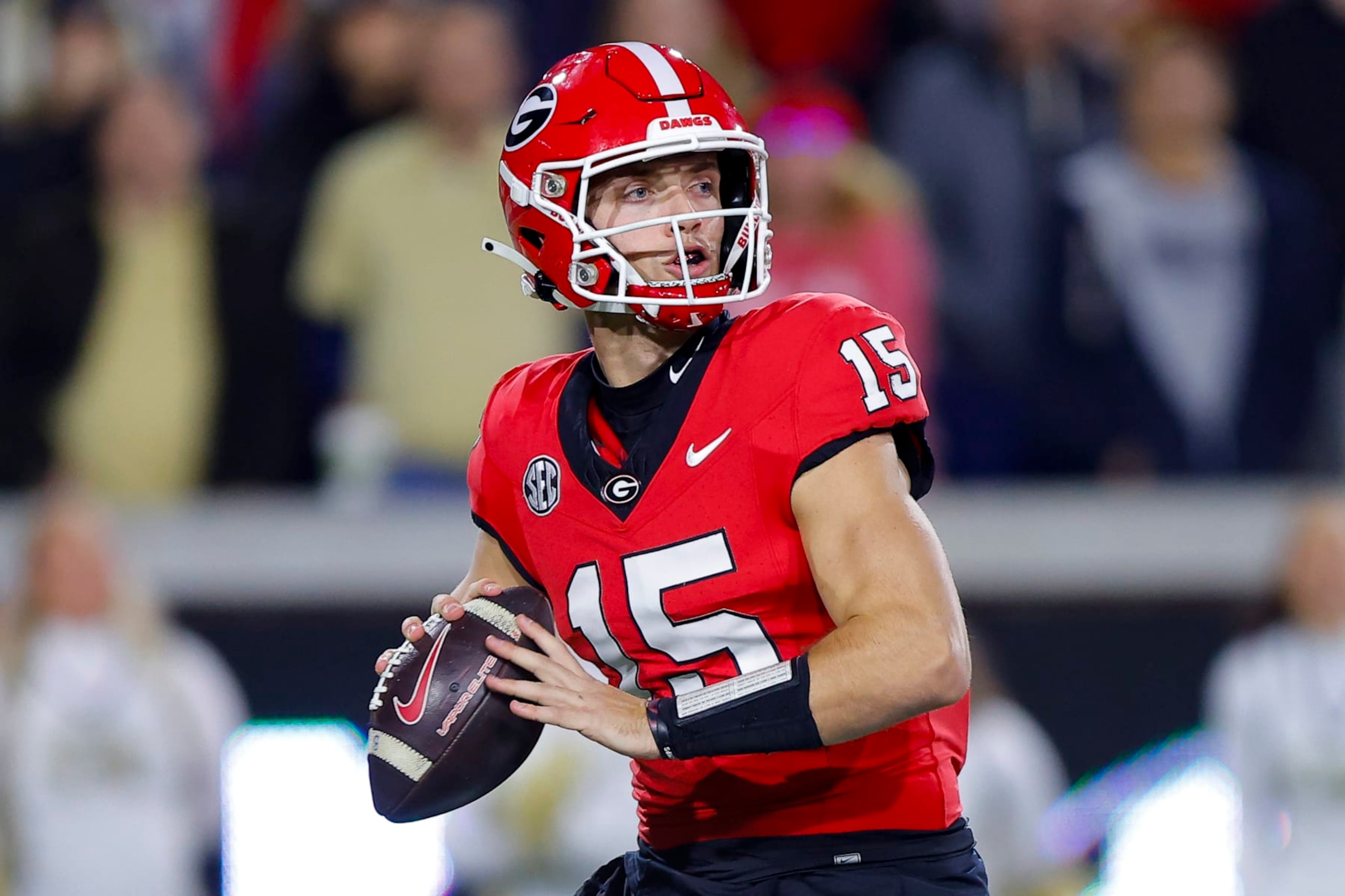 ATLANTA, GEORGIA - NOVEMBER 25: Carson Beck #15 of the Georgia Bulldogs passes during the first quarter against the Georgia Tech Yellow Jackets at Bobby Dodd Stadium on November 25, 2023 in Atlanta, Georgia. (Photo by Todd Kirkland/Getty Images)