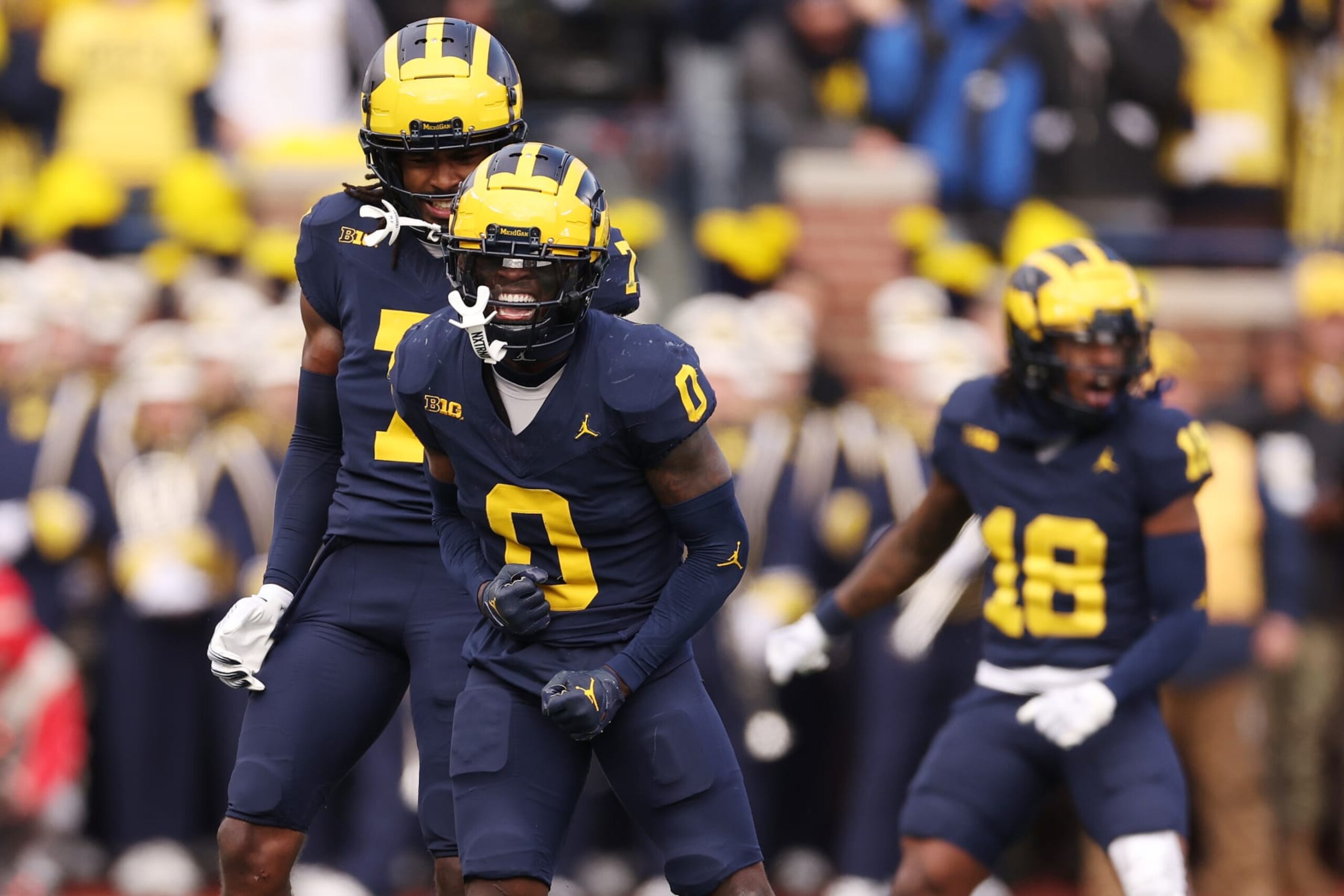ANN ARBOR, MICHIGAN - NOVEMBER 25: Mike Sainristil #0 of the Michigan Wolverines celebrates while playing the Ohio State Buckeyes at Michigan Stadium on November 25, 2023 in Ann Arbor, Michigan. (Photo by Gregory Shamus/Getty Images)