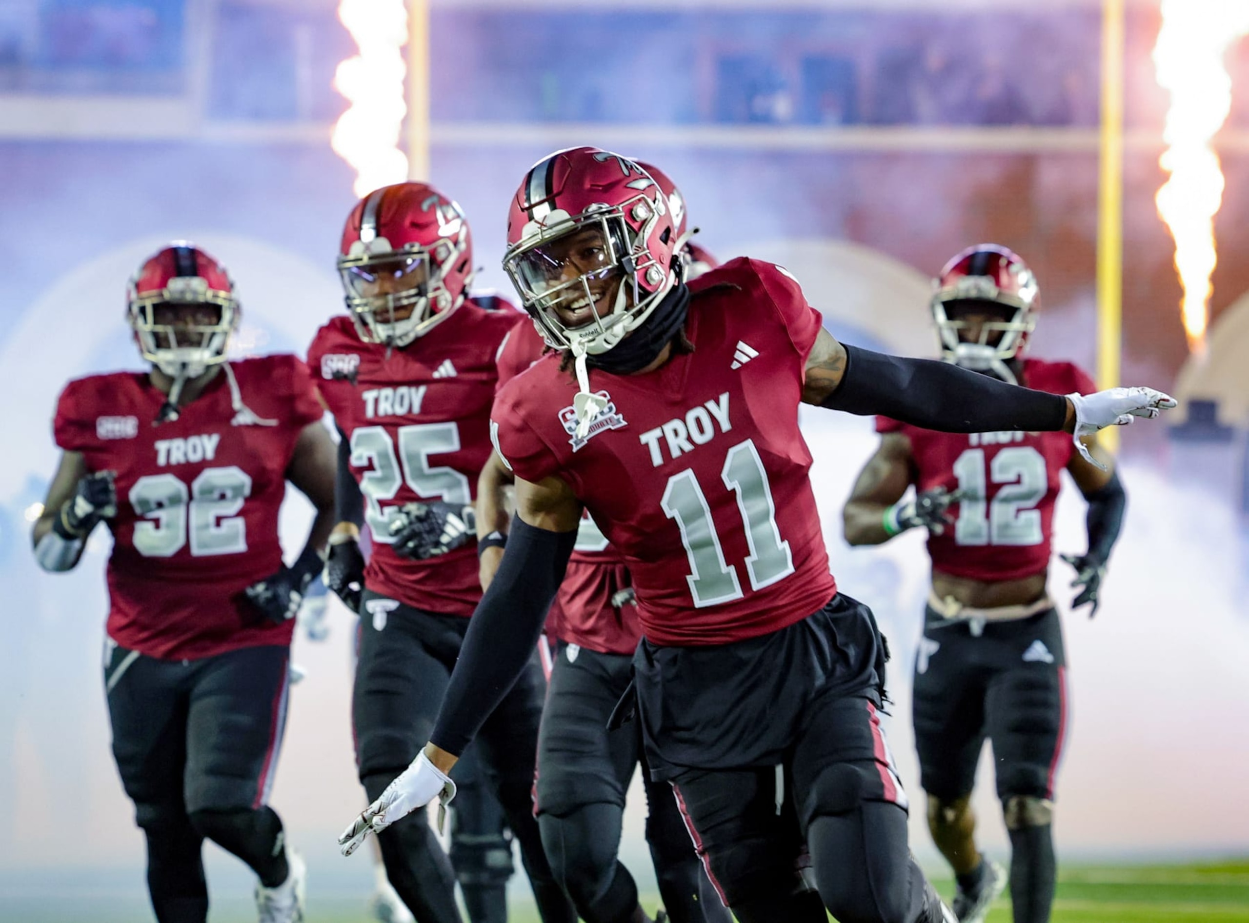 TROY, ALABAMA - NOVEMBER 2: O'shai Fletcher #11 of the Troy Trojans takes the field prior to kickoff against the South Alabama Jaguars at Veterans Memorial Stadium on November 2, 2023 in Troy, Alabama. (Photo by Brandon Sumrall/Getty Images) TROY, ALABAMA - NOVEMBER 2: O'shai Fletcher #11 of the Troy Trojans takes the field prior to kickoff against the South Alabama Jaguars at Veterans Memorial Stadium on November 2, 2023 in Troy, Alabama. (Photo by Brandon Sumrall/Getty Images)