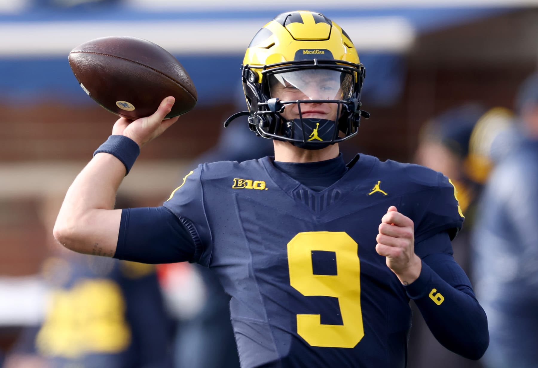 ANN ARBOR, MICHIGAN - NOVEMBER 25: J.J. McCarthy #9 of the Michigan Wolverines warms up prior to the game against the Ohio State Buckeyes at Michigan Stadium on November 25, 2023 in Ann Arbor, Michigan. (Photo by Gregory Shamus/Getty Images)