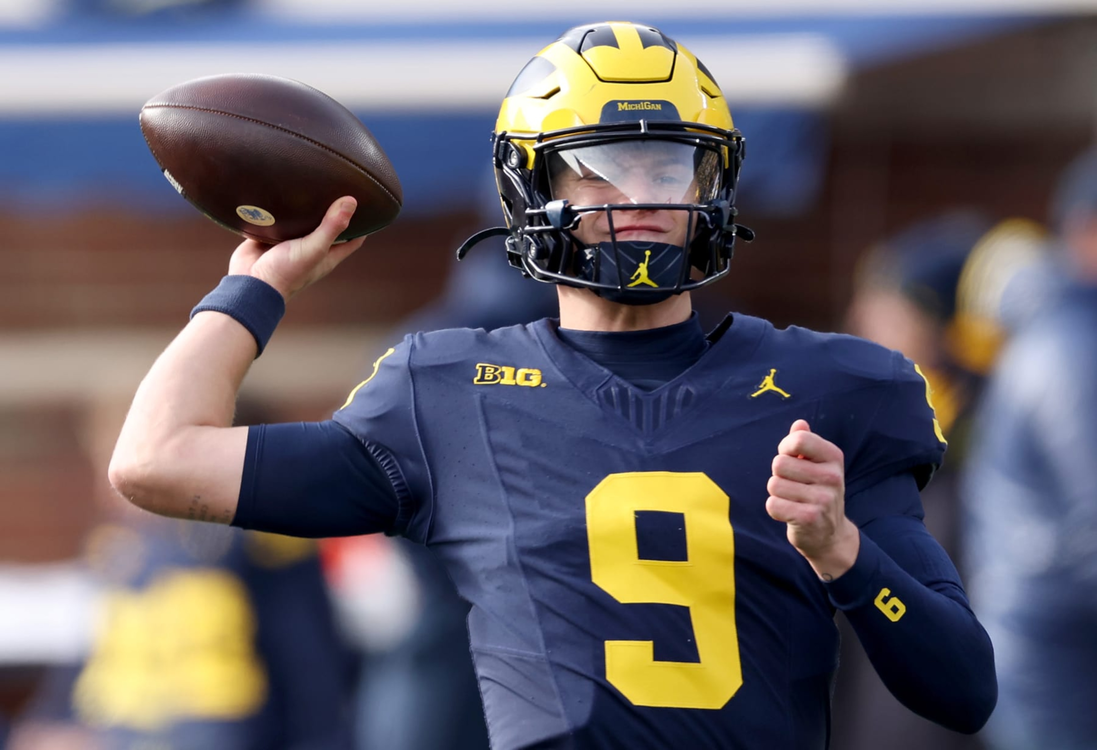 ANN ARBOR, MICHIGAN - NOVEMBER 25: J.J. McCarthy #9 of the Michigan Wolverines warms up prior to the game against the Ohio State Buckeyes at Michigan Stadium on November 25, 2023 in Ann Arbor, Michigan. (Photo by Gregory Shamus/Getty Images) ANN ARBOR, MICHIGAN - NOVEMBER 25: J.J. McCarthy #9 of the Michigan Wolverines warms up prior to the game against the Ohio State Buckeyes at Michigan Stadium on November 25, 2023 in Ann Arbor, Michigan. (Photo by Gregory Shamus/Getty Images)