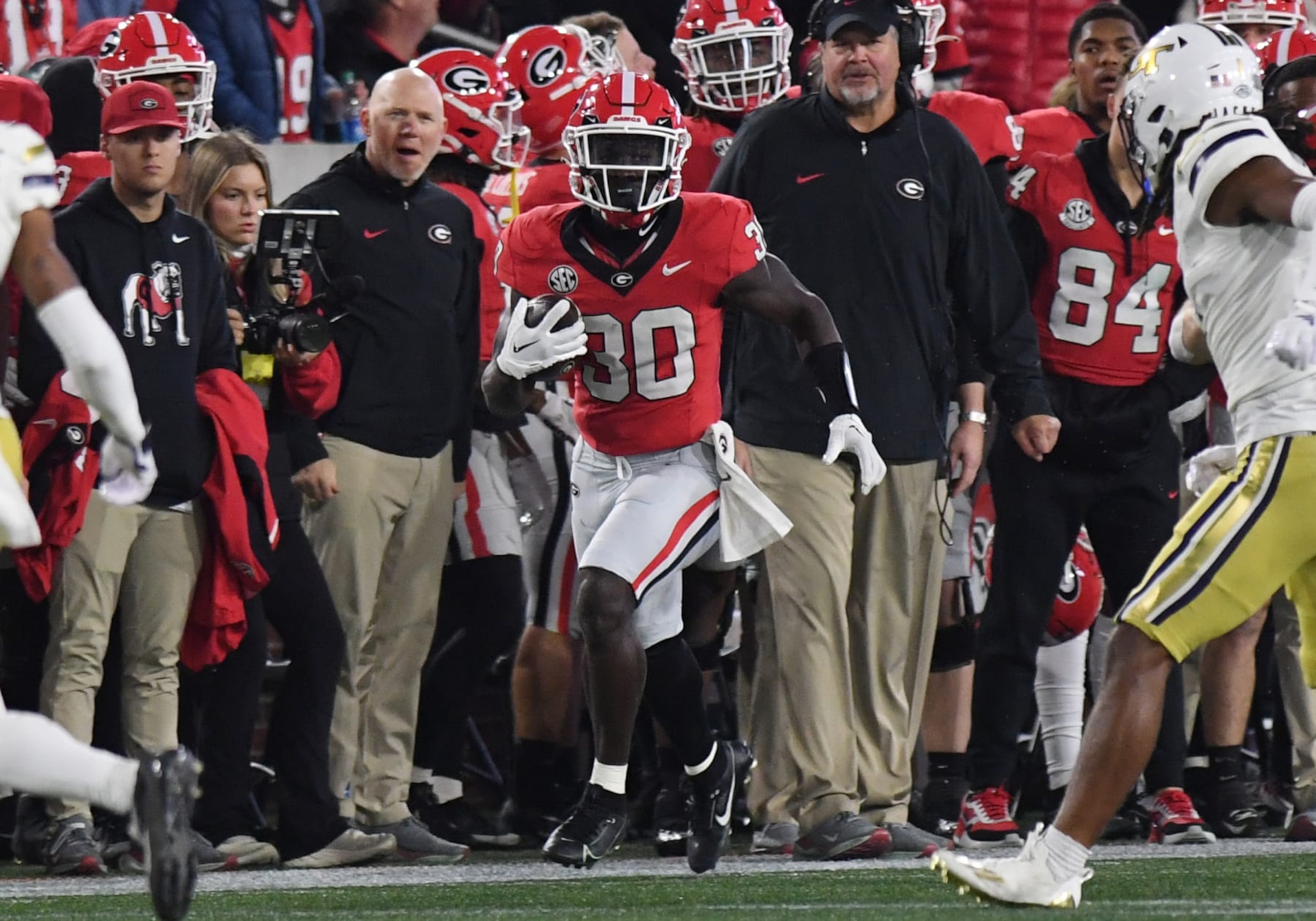 ATLANTA, GA - NOVEMBER 25: Georgia Bulldogs Running Back Daijun Edwards (30) rushes the ball during the college football game between the Georgia Bulldogs and the Georgia Tech Yellow Jackets on November 25, 2023, at Bobby Dodd Stadium in Atlanta, GA. (Photo by Jeffrey Vest/Icon Sportswire via Getty Images) ATLANTA, GA - NOVEMBER 25: Georgia Bulldogs Running Back Daijun Edwards (30) rushes the ball during the college football game between the Georgia Bulldogs and the Georgia Tech Yellow Jackets on November 25, 2023, at Bobby Dodd Stadium in Atlanta, GA. (Photo by Jeffrey Vest/Icon Sportswire via Getty Images)