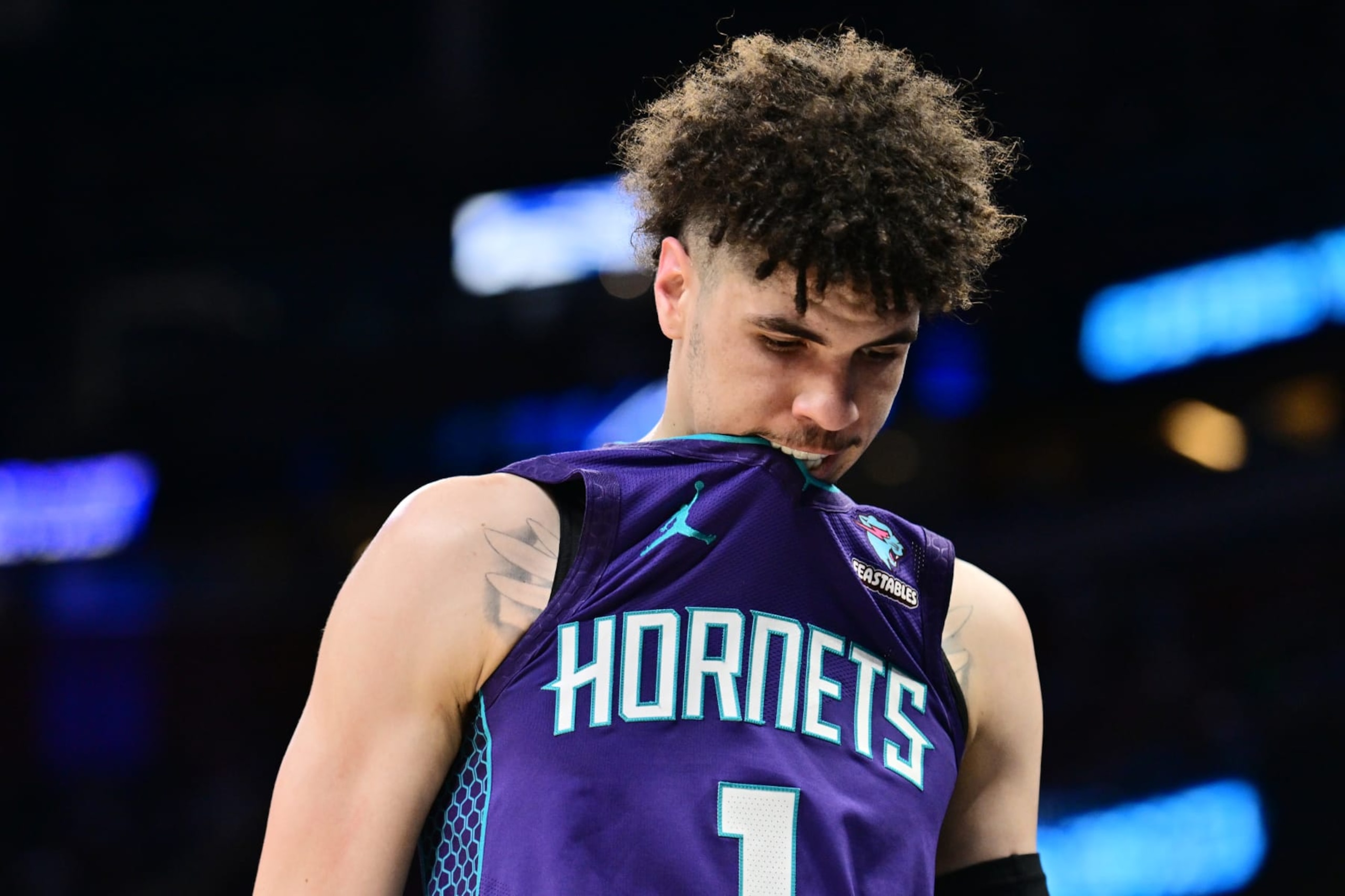 ORLANDO, FLORIDA - NOVEMBER 26: LaMelo Ball #1 of the Charlotte Hornets walks off the court in the first half of a game against the Orlando Magic at Amway Center on November 26, 2023 in Orlando, Florida. NOTE TO USER: User expressly acknowledges and agrees that, by downloading and or using this photograph, User is consenting to the terms and conditions of the Getty Images License Agreement. (Photo by Julio Aguilar/Getty Images)