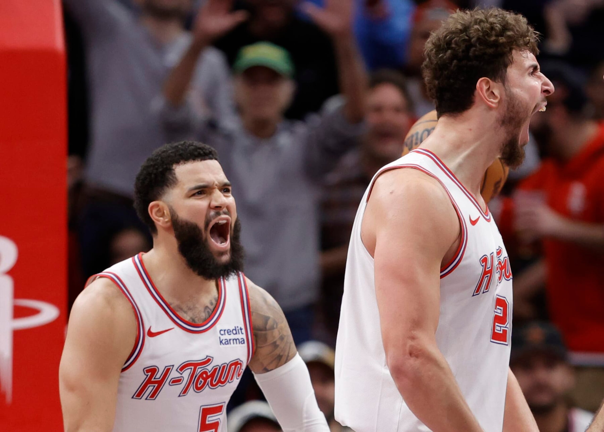 HOUSTON, TEXAS - NOVEMBER 10: Alperen Sengun #28 and Fred VanVleet #5 of the Houston Rockets react to a basket during the second half against the New Orleans Pelicans at Toyota Center on November 10, 2023 in Houston, Texas. NOTE TO USER: User expressly acknowledges and agrees that, by downloading and or using this photograph, User is consenting to the terms and conditions of the Getty Images License Agreement.  (Photo by Carmen Mandato/Getty Images)
