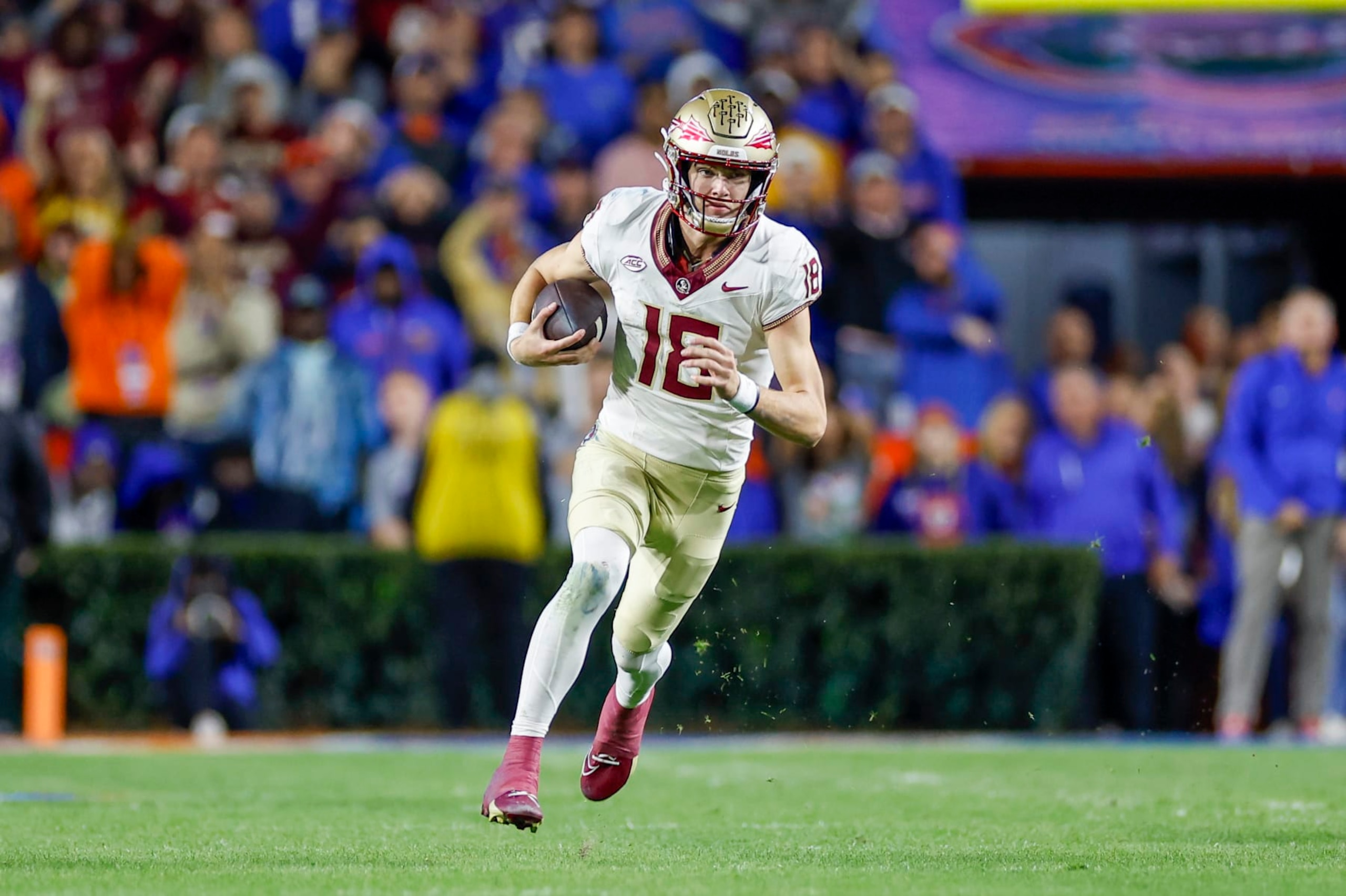GAINESVILLE, FL - NOVEMBER 25: Florida State Seminoles quarterback Tate Rodemaker (18) runs with the ball during the game between the Florida Gators and the Florida State Seminoles on November 25, 2023 at Ben Hill Griffin Stadium at Florida Field in Gainesville, Fl. (Photo by David Rosenblum/Icon Sportswire via Getty Images)