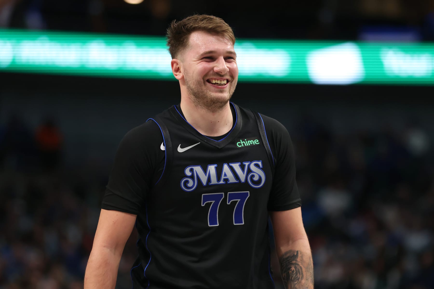 DALLAS, TEXAS - NOVEMBER 28: Luka Doncic #77 of the Dallas Mavericks reacts after a play during an NBA In-Season Tournament game against the Houston Rockets at American Airlines Center on November 28, 2023 in Dallas, Texas. NOTE TO USER: User expressly acknowledges and agrees that, by downloading and or using this photograph, User is consenting to the terms and conditions of the Getty Images License Agreement. (Photo by Tim Heitman/Getty Images)