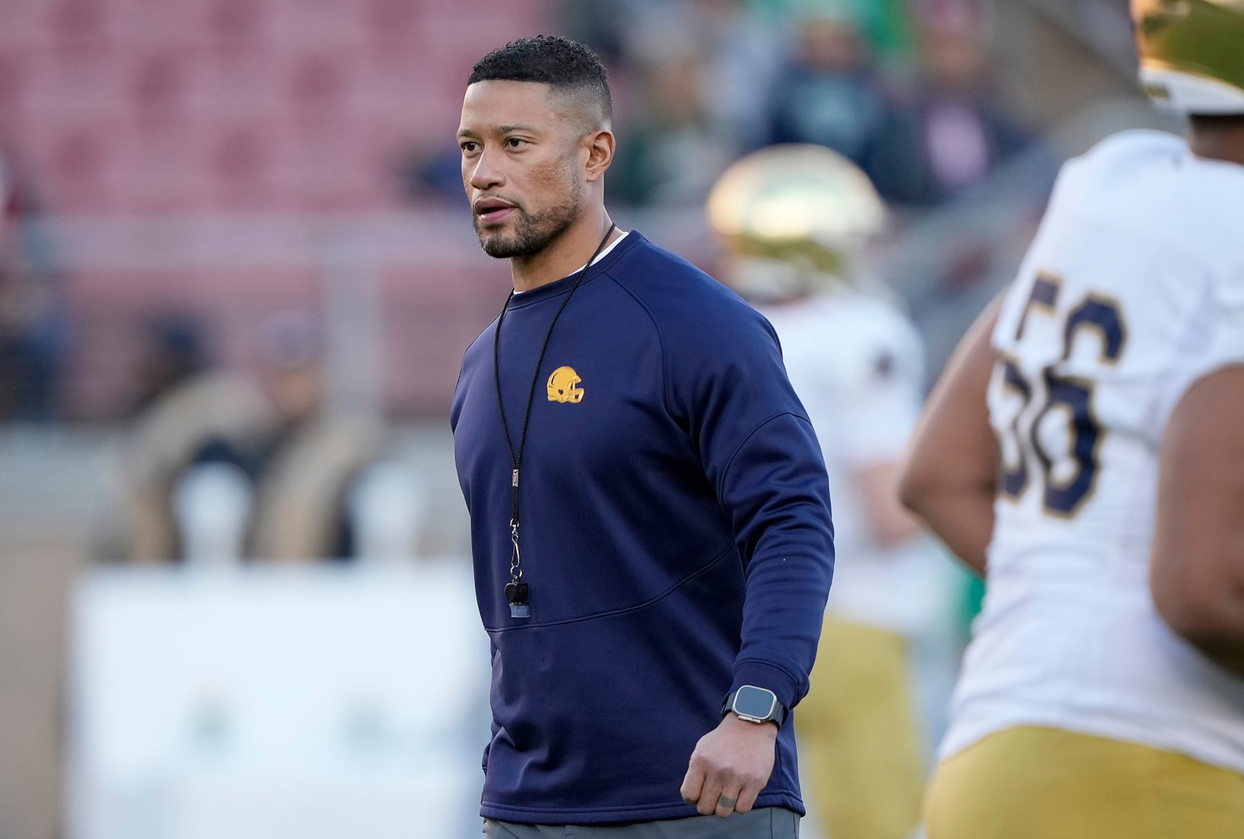 STANFORD, CALIFORNIA - NOVEMBER 25: Head coach Marcus Freeman of the Notre Dame Fighting Irish looks on while his team warms up prior to playing the Stanford Cardinal at Stanford Stadium on November 25, 2023 in Stanford, California. (Photo by Thearon W. Henderson/Getty Images)