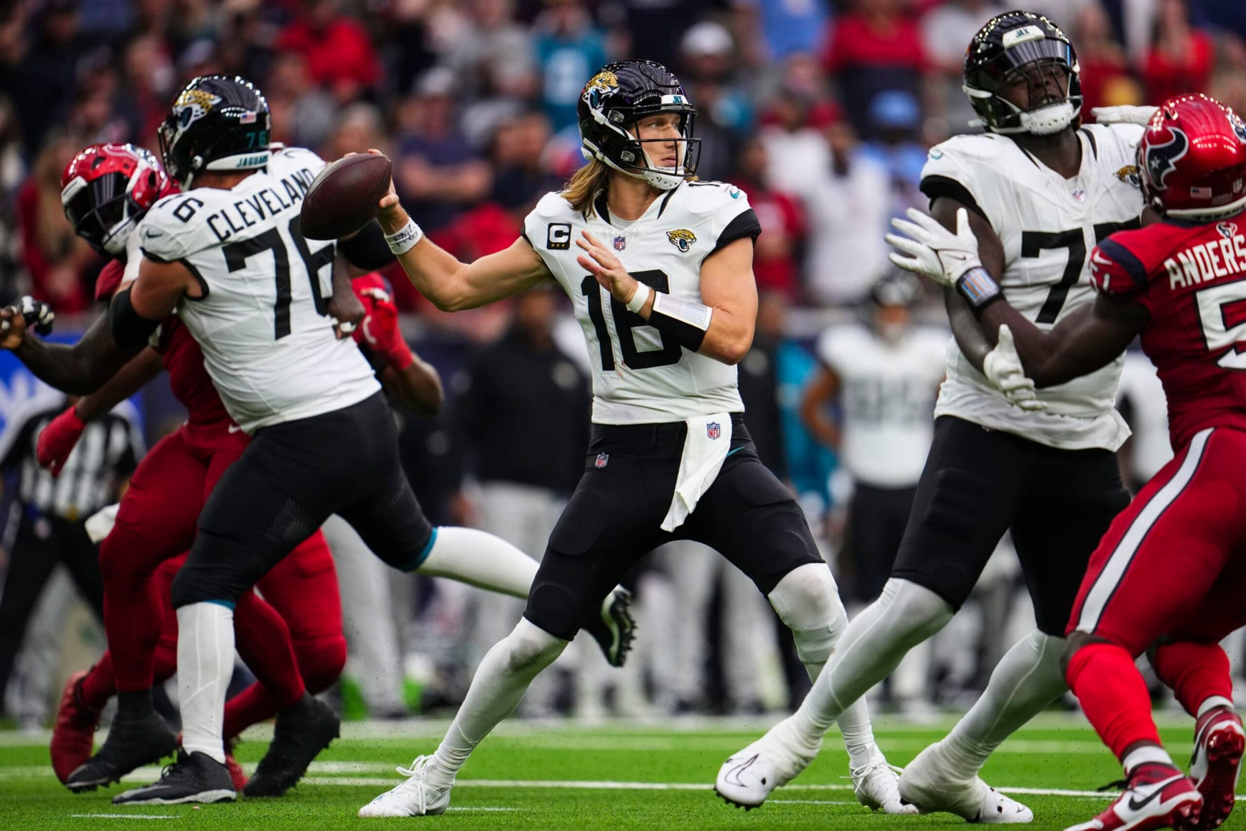 HOUSTON, TX - NOVEMBER 26: Trevor Lawrence #16 of the Jacksonville Jaguars throws the ball during an NFL football game against the Houston Texans at NRG Stadium on November 26, 2023 in Houston, Texas. (Photo by Cooper Neill/Getty Images) HOUSTON, TX - NOVEMBER 26: Trevor Lawrence #16 of the Jacksonville Jaguars throws the ball during an NFL football game against the Houston Texans at NRG Stadium on November 26, 2023 in Houston, Texas. (Photo by Cooper Neill/Getty Images)