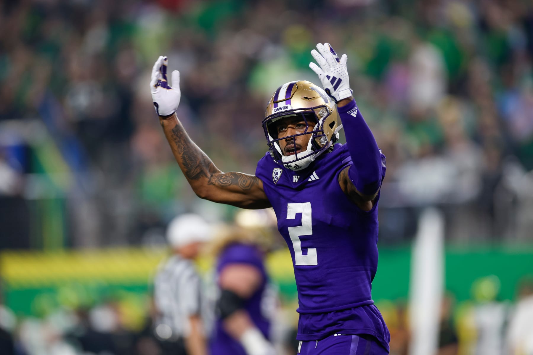 LAS VEGAS, NEVADA - DECEMBER 1: Ja'Lynn Polk #2 of the Washington Huskies celebrates in the first quarter during the Pac-12 Championship game against the Oregon Ducks at Allegiant Stadium on December 1, 2023 in Las Vegas, Nevada. (Photo by Brandon Sloter/Image Of Sport/Getty Images)