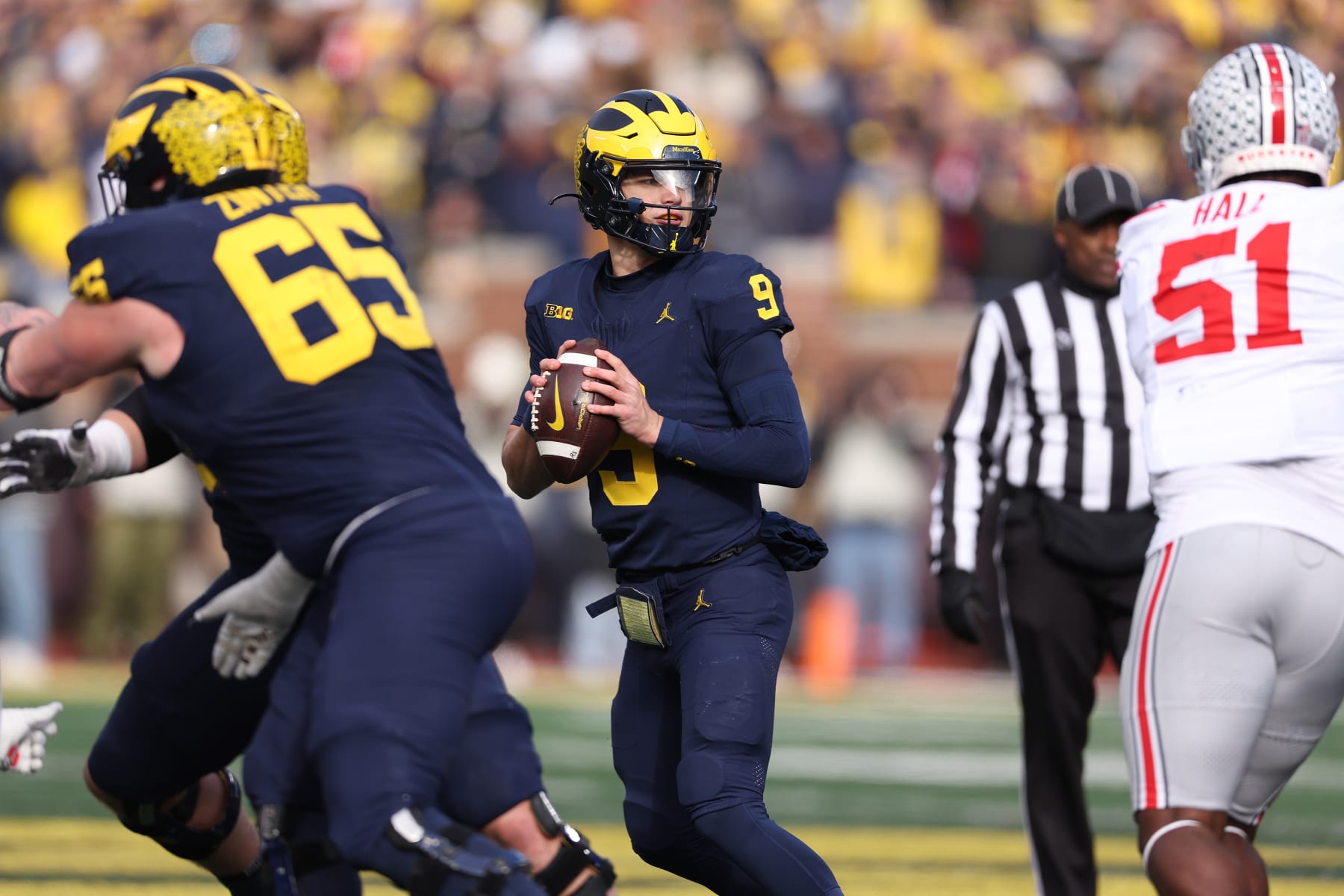 ANN ARBOR, MICHIGAN - NOVEMBER 25: J.J. McCarthy #9 of the Michigan Wolverines plays against the Ohio State Buckeyes at Michigan Stadium on November 25, 2023 in Ann Arbor, Michigan. (Photo by Gregory Shamus/Getty Images)
