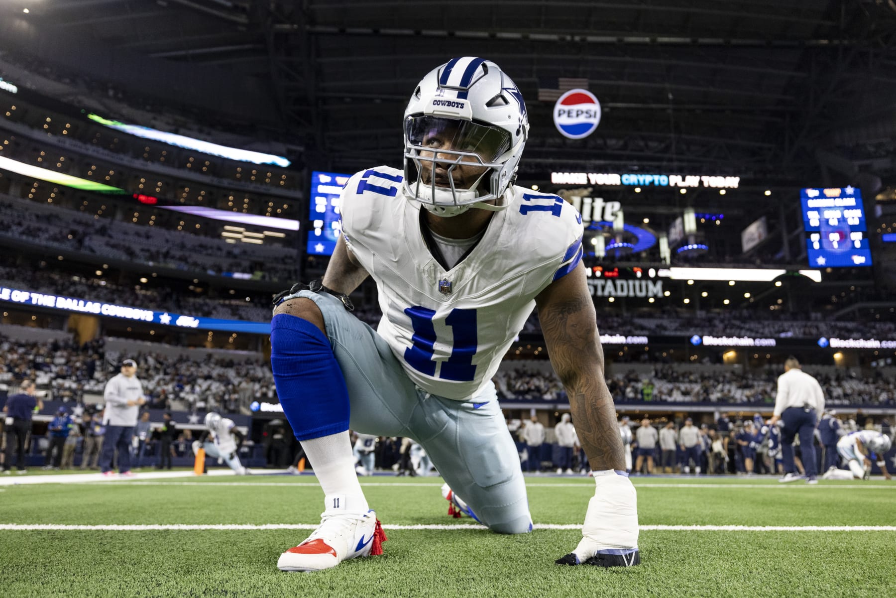ARLINGTON, TEXAS - NOVEMBER 30: Micah Parsons #11 of the Dallas Cowboys looks on as he stretches prior to an NFL football game between the Dallas Cowboys and the Seattle Seahawks at AT&T Stadium on November 30, 2023 in Arlington, Texas. (Photo by Michael Owens/Getty Images)