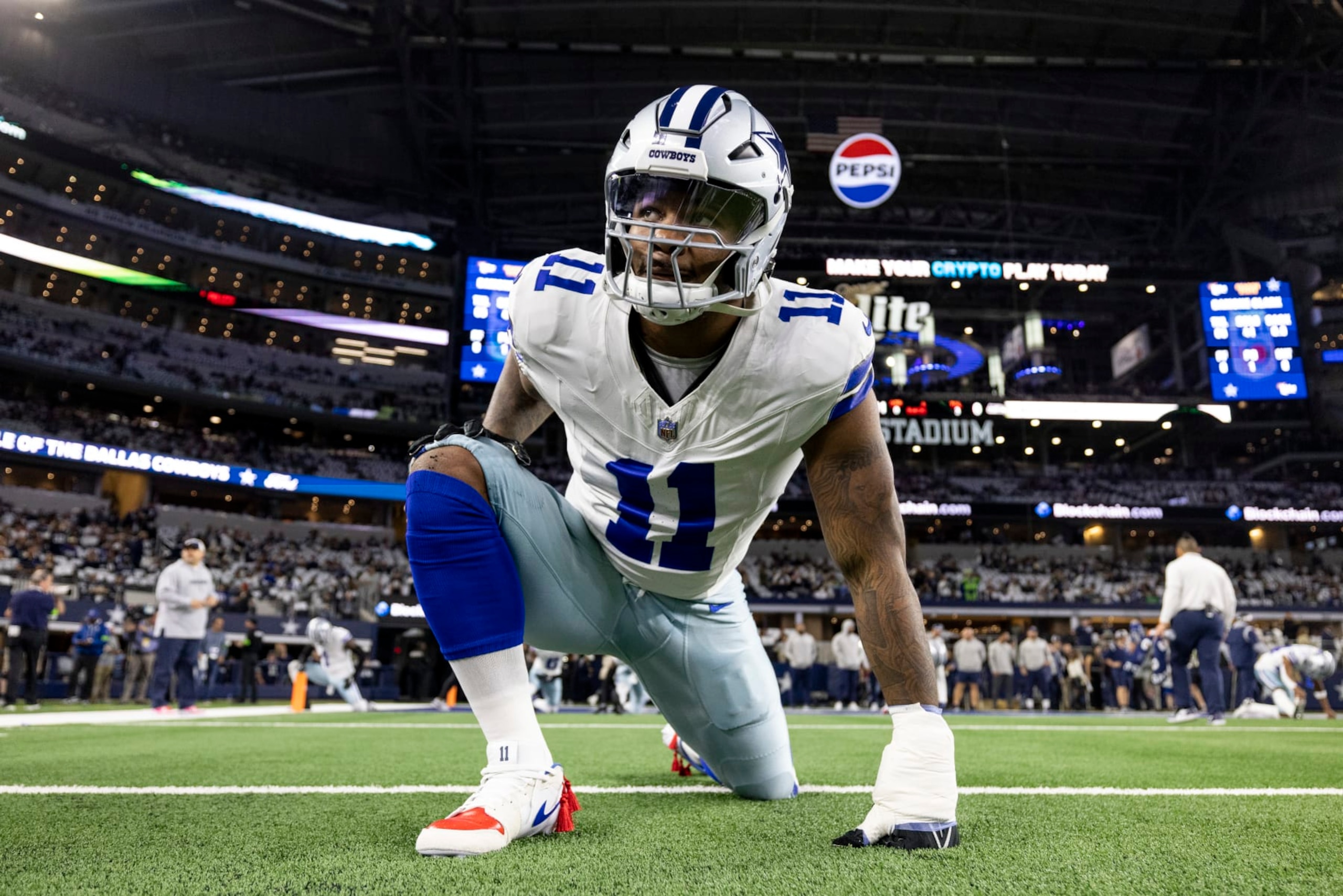 ARLINGTON, TEXAS - NOVEMBER 30: Micah Parsons #11 of the Dallas Cowboys looks on as he stretches prior to an NFL football game between the Dallas Cowboys and the Seattle Seahawks at AT&T Stadium on November 30, 2023 in Arlington, Texas. (Photo by Michael Owens/Getty Images)
