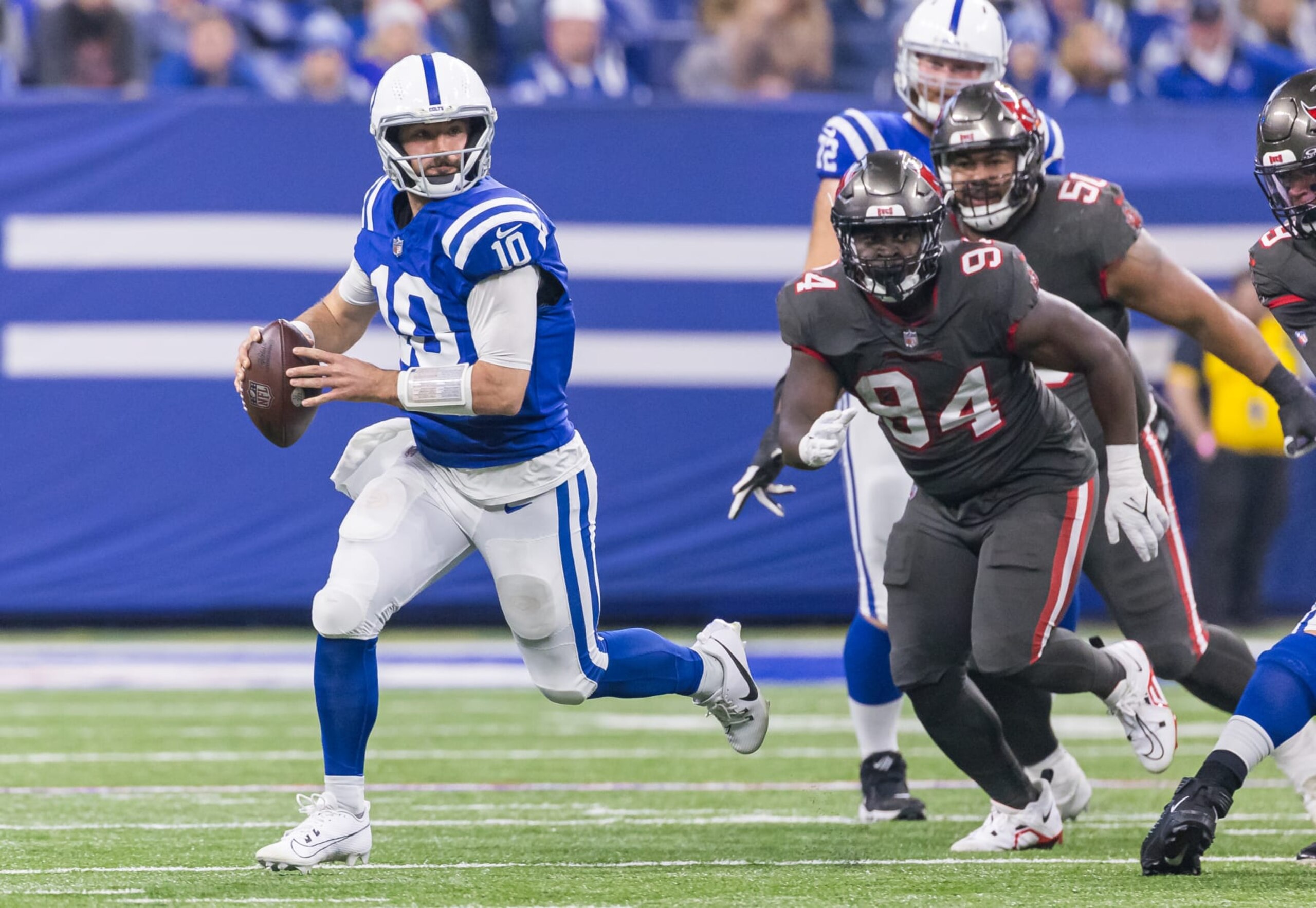 INDIANAPOLIS, INDIANA - NOVEMBER 26: Gardner Minshew #10 of the Indianapolis Colts runs the ball during the game against the Tampa Bay Buccaneers at Lucas Oil Stadium on November 26, 2023 in Indianapolis, Indiana. (Photo by Michael Hickey/Getty Images)