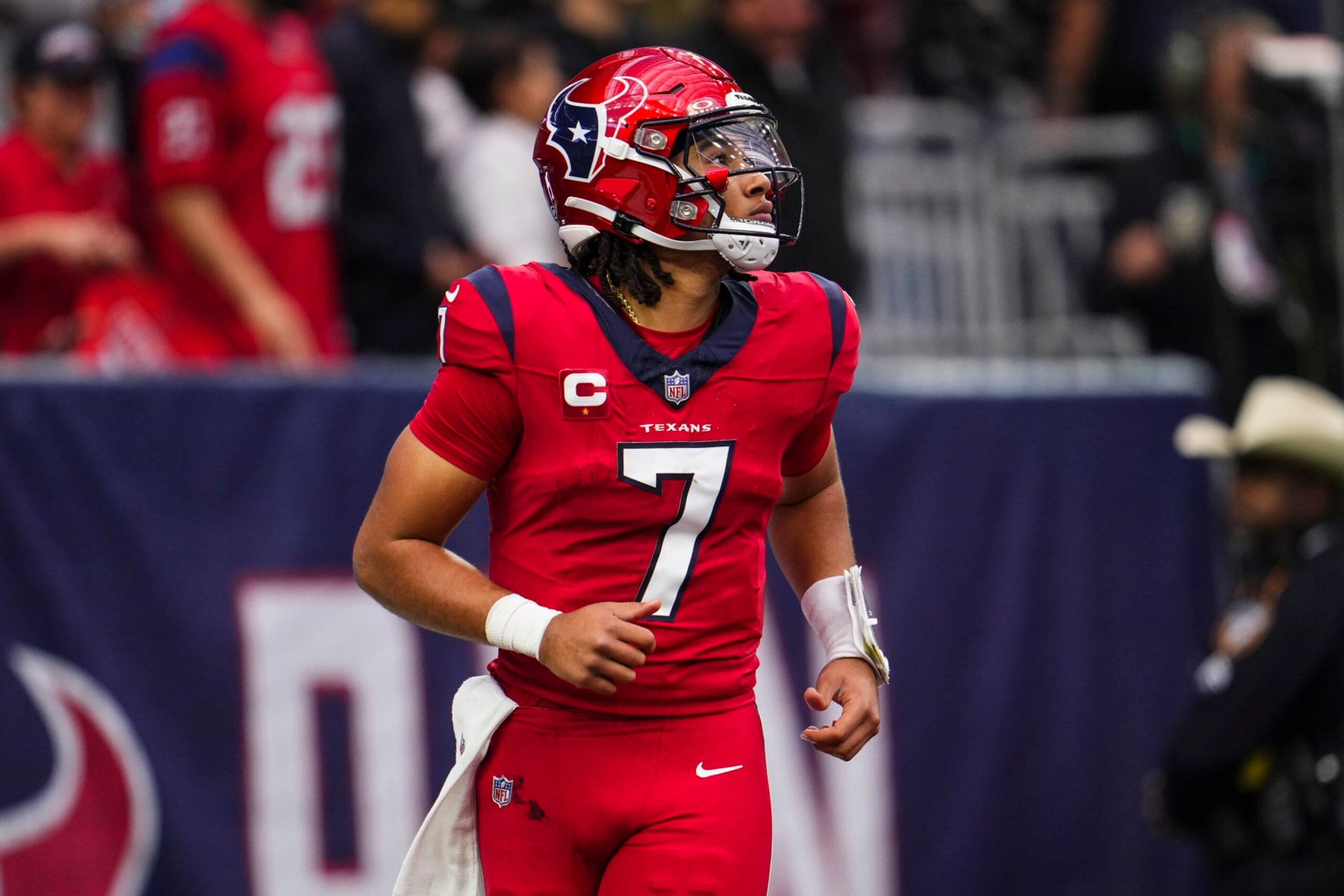 HOUSTON, TX - NOVEMBER 26: C.J. Stroud #7 of the Houston Texans looks on from the field during an NFL football game against the Jacksonville Jaguars at NRG Stadium on November 26, 2023 in Houston, Texas. (Photo by Cooper Neill/Getty Images)