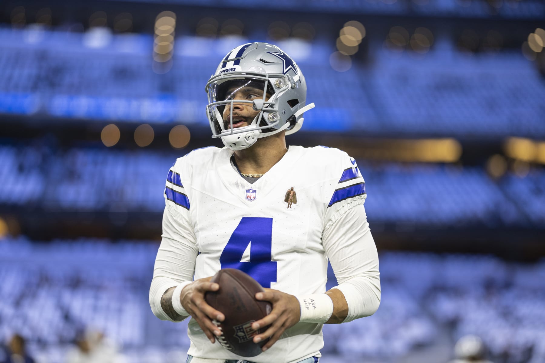 ARLINGTON, TEXAS - NOVEMBER 30: Dak Prescott #4 of the Dallas Cowboys looks to pass as he warms up prior to an NFL football game between the Dallas Cowboys and the Seattle Seahawks at AT&T Stadium on November 30, 2023 in Arlington, Texas. (Photo by Michael Owens/Getty Images)