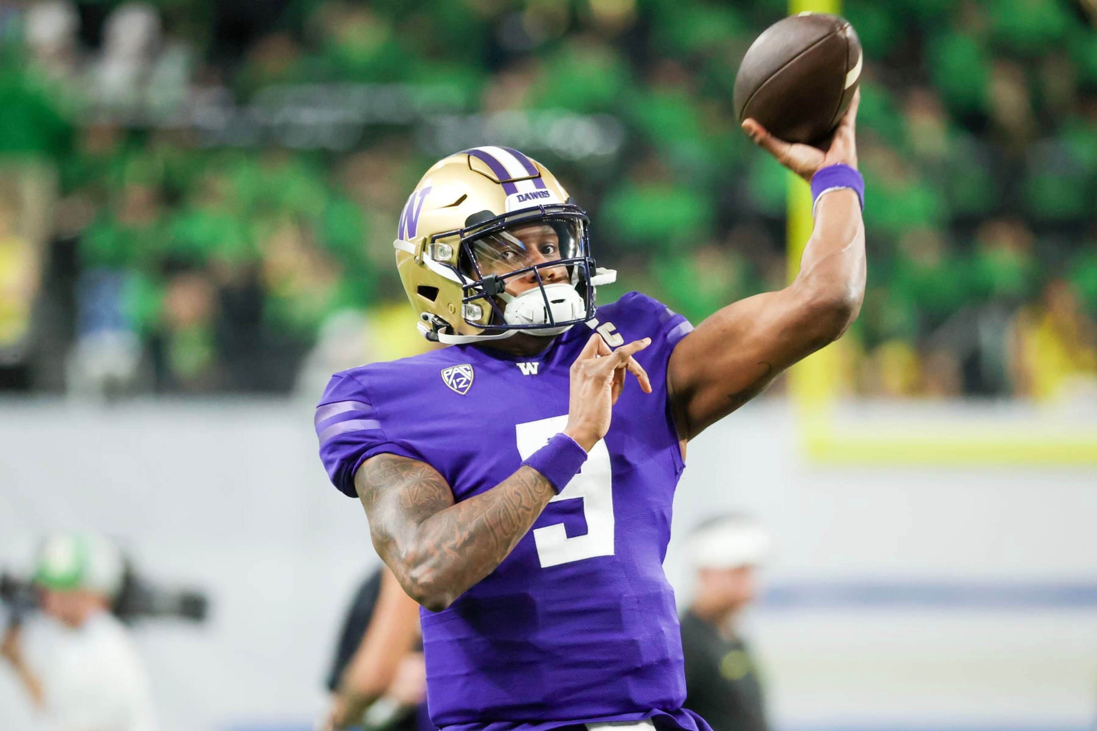 LAS VEGAS, NEVADA - DECEMBER 01: Michael Penix Jr. #9 of the Washington Huskies warms up prior to a game against the Oregon Ducks during the Pac-12 Championship at Allegiant Stadium on December 01, 2023 in Las Vegas, Nevada. (Photo by Ian Maule/Getty Images)