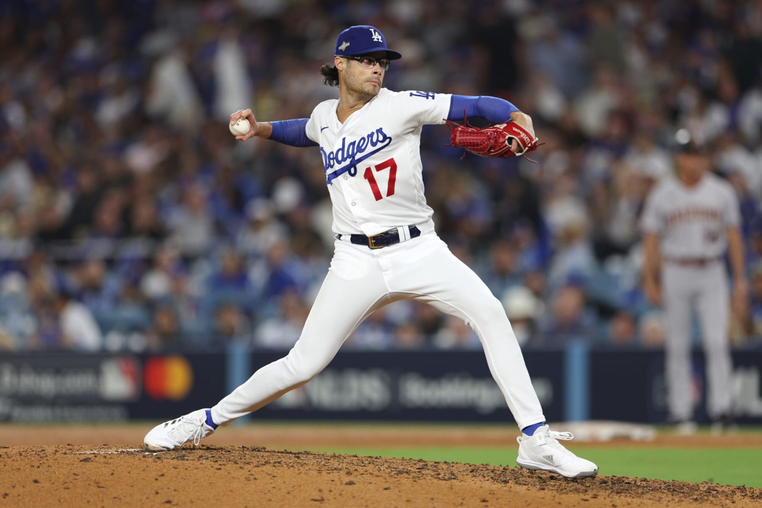 LOS ANGELES, CALIFORNIA - OCTOBER 09: Joe Kelly #17 of the Los Angeles Dodgers pitches against the Arizona Diamondbacks during the seventh inning in Game Two of the Division Series at Dodger Stadium on October 09, 2023 in Los Angeles, California. (Photo by Harry How/Getty Images) LOS ANGELES, CALIFORNIA - OCTOBER 09: Joe Kelly #17 of the Los Angeles Dodgers pitches against the Arizona Diamondbacks during the seventh inning in Game Two of the Division Series at Dodger Stadium on October 09, 2023 in Los Angeles, California. (Photo by Harry How/Getty Images)