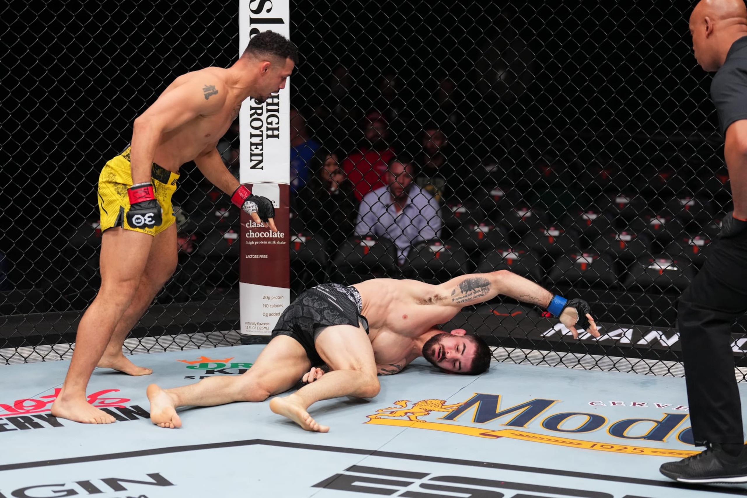 AUSTIN, TEXAS - DECEMBER 02: (L-R) Drakkar Klose knocks out Joe Solecki with a slam in a lightweight fight during the UFC Fight Night event at Moody Center on December 02, 2023 in Austin, Texas. (Photo by Josh Hedges/Zuffa LLC via Getty Images)