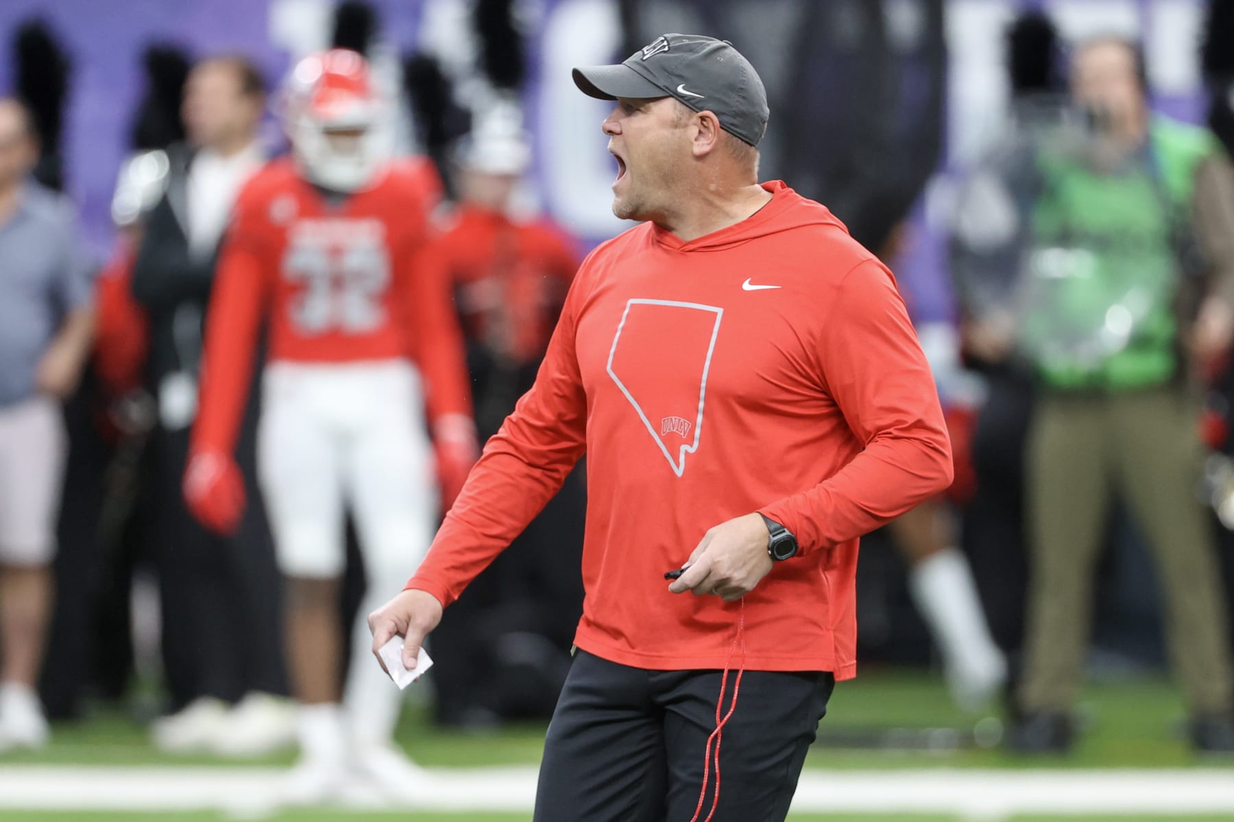 LAS VEGAS, NEVADA - DECEMBER 02: Head coach Barry Odom of the UNLV Rebels yells prior to a game against the Boise State Broncos during the Mountain West Football Championship at Allegiant Stadium on December 02, 2023 in Las Vegas, Nevada. (Photo by Ian Maule/Getty Images)