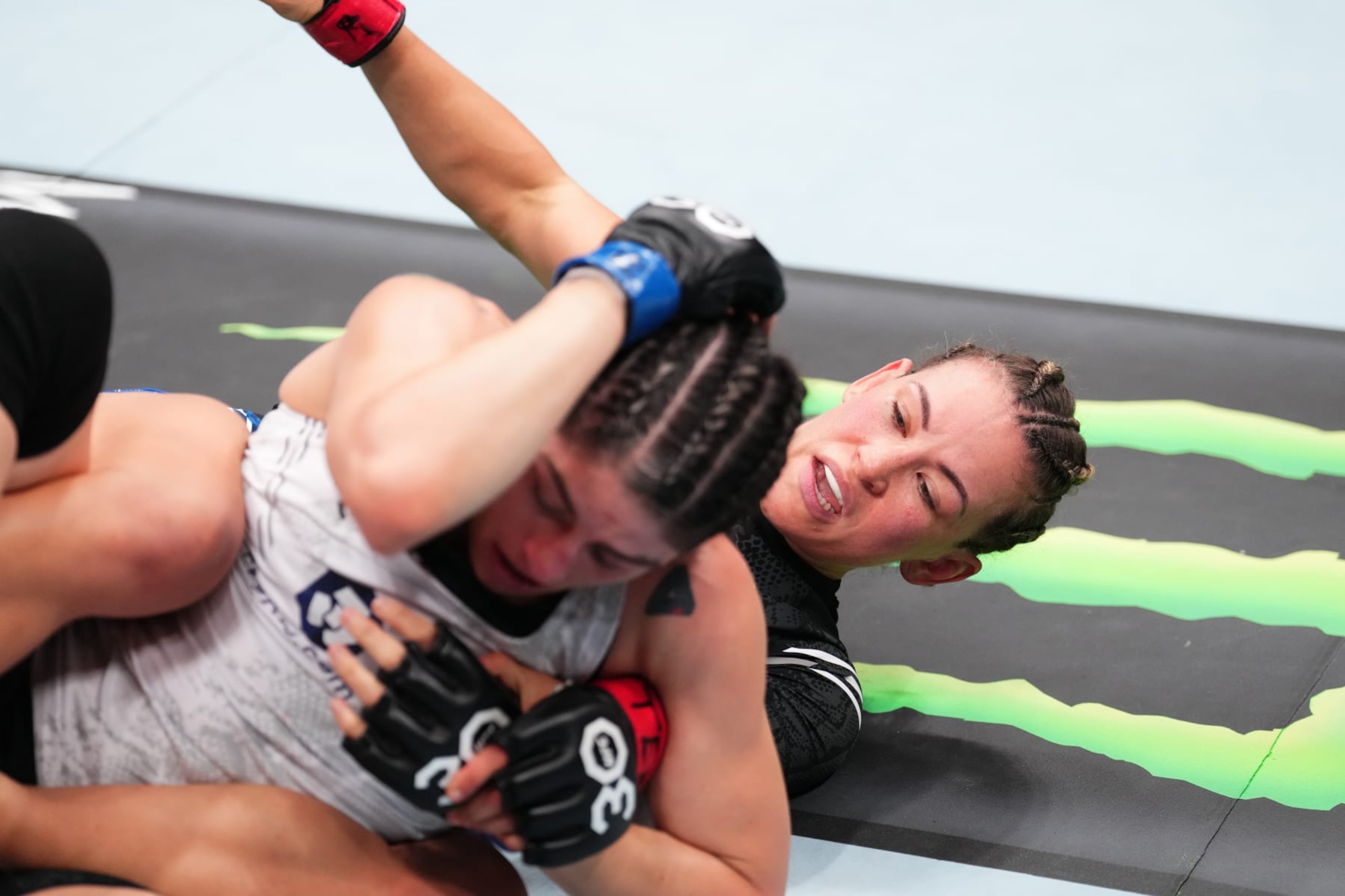 AUSTIN, TEXAS - DECEMBER 02: (R-L) Miesha Tate punches Julia Avila in a bantamweight fight during the UFC Fight Night event at Moody Center on December 02, 2023 in Austin, Texas. (Photo by Josh Hedges/Zuffa LLC via Getty Images)