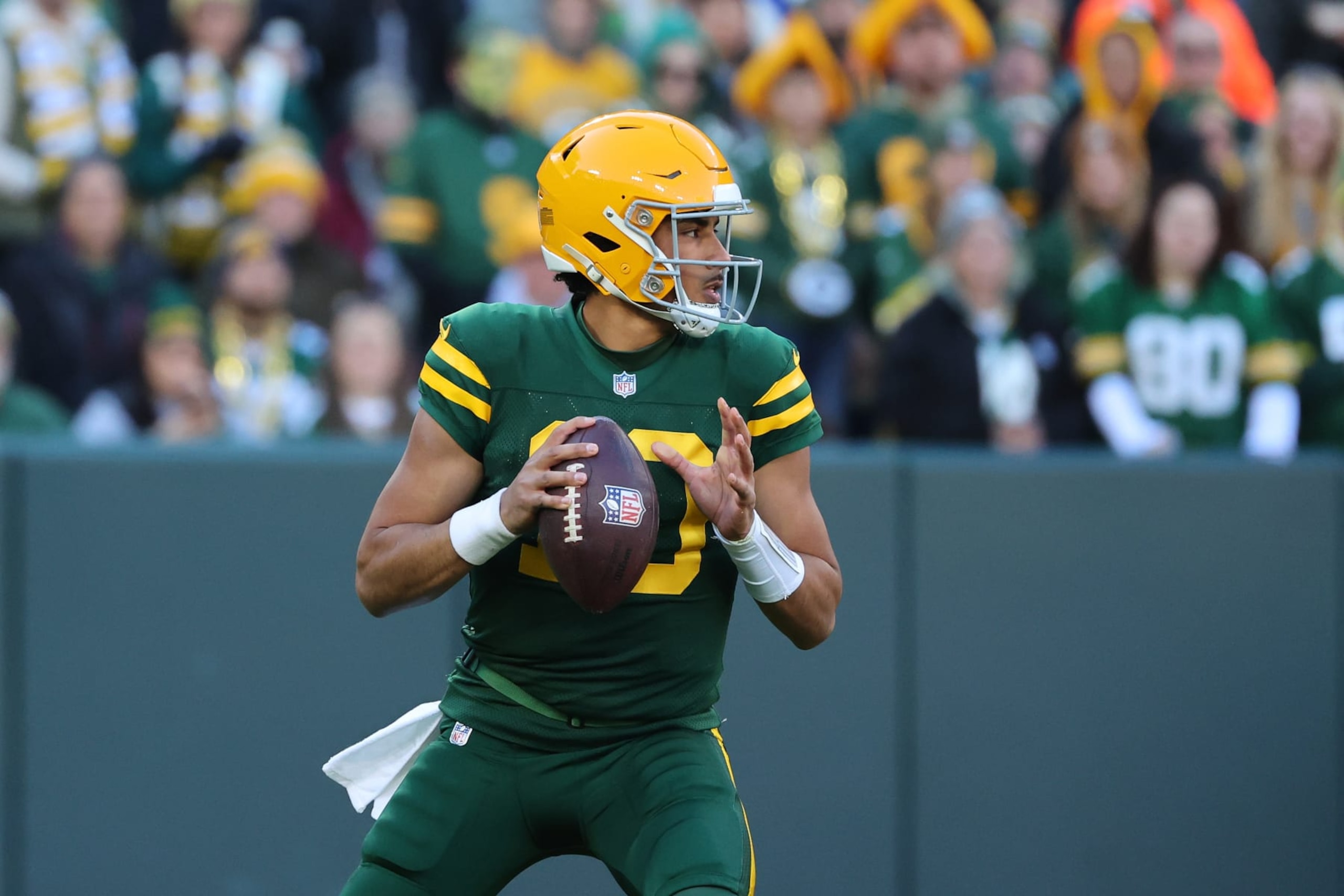 GREEN BAY, WISCONSIN - NOVEMBER 19: Jordan Love #10 of the Green Bay Packers drops back to pass during a game against the Los Angeles Chargers at Lambeau Field on November 19, 2023 in Green Bay, Wisconsin. The Packers defeated the Chargers 23-20. (Photo by Stacy Revere/Getty Images)