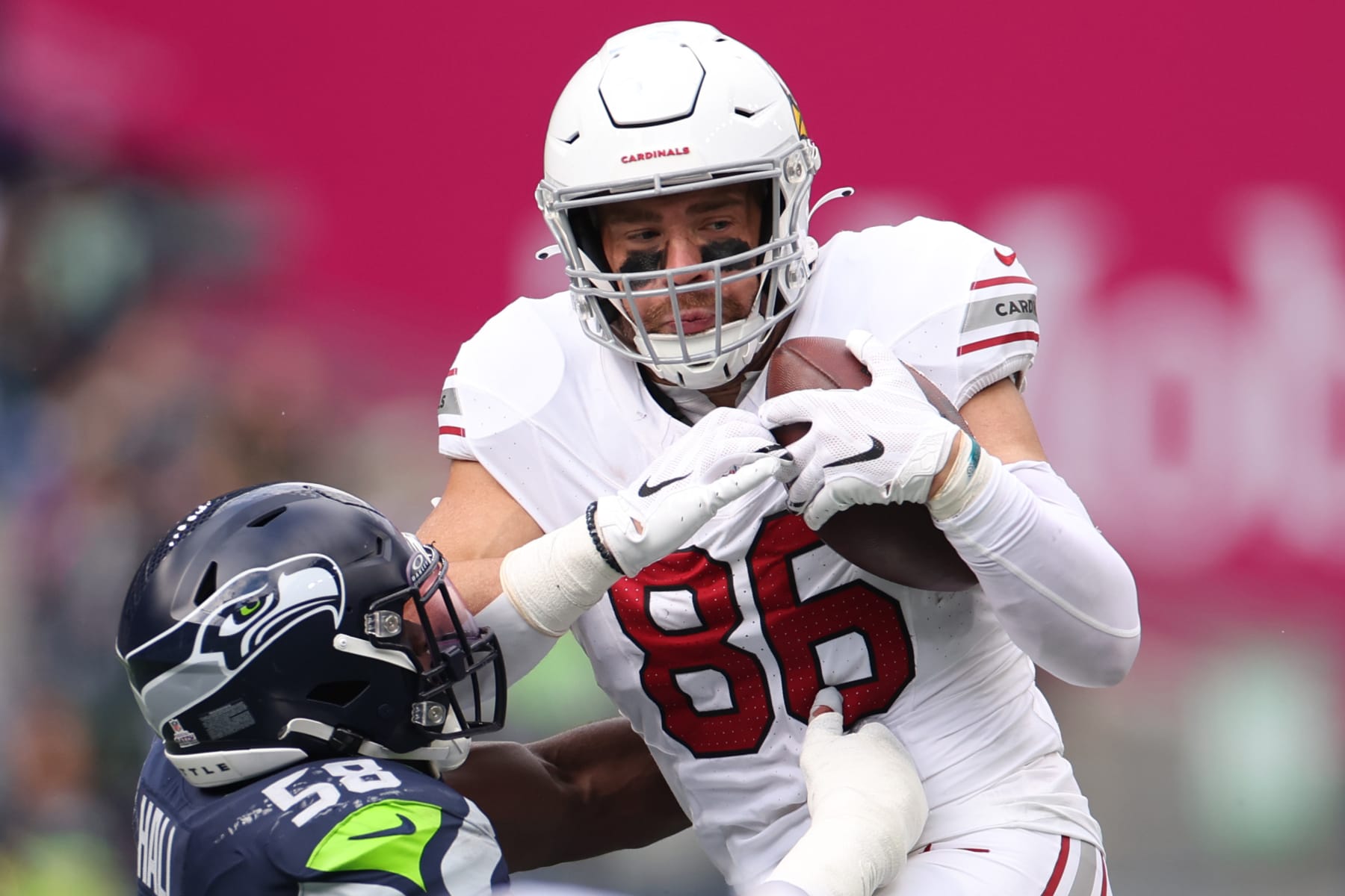 SEATTLE, WASHINGTON - OCTOBER 22: Zach Ertz #86 of the Arizona Cardinals carries the ball during the fourth quarter of the game against the Seattle Seahawks at Lumen Field on October 22, 2023 in Seattle, Washington. (Photo by Steph Chambers/Getty Images)