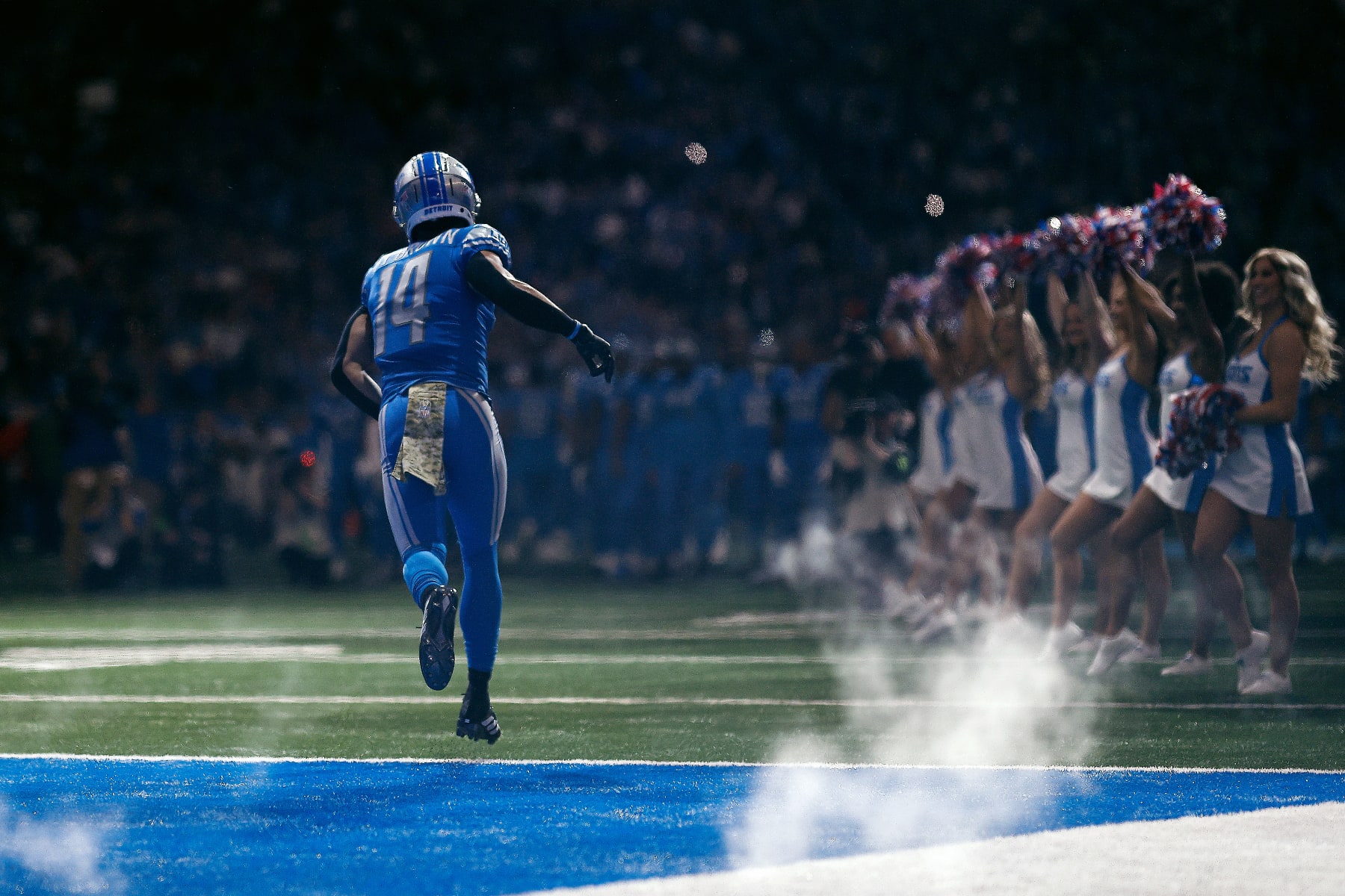 DETROIT, MICHIGAN - NOVEMBER 19: Amon-Ra St. Brown #14 of the Detroit Lions is introduced before a game against the Chicago Bears at Ford Field on November 19, 2023 in Detroit, Michigan. (Photo by Mike Mulholland/Getty Images)