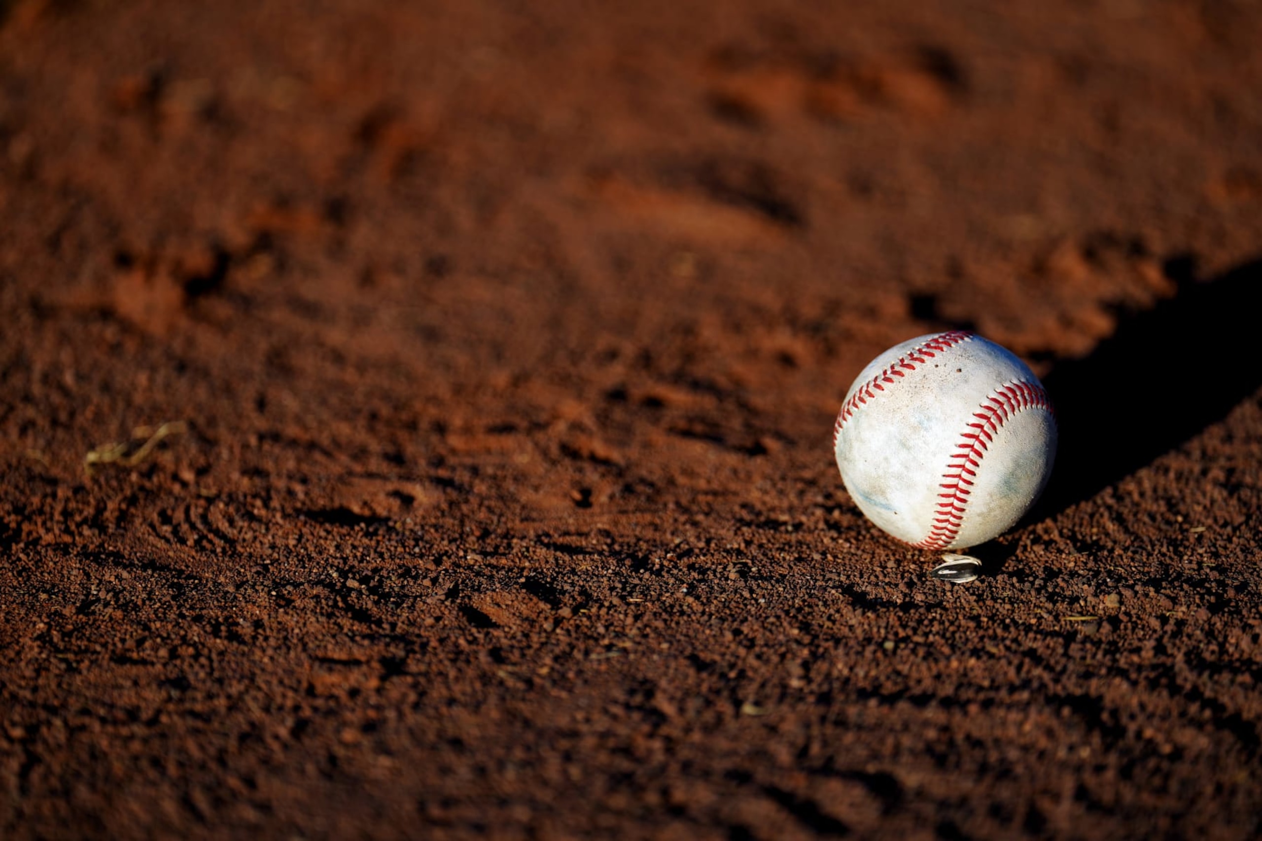 SURPRISE, AZ - NOVEMBER 11: A detail shot of a baseball on the field prior to the 2023 Arizona Fall League Championship Game between the Peoria Javelinas and the Surprise Saguaros at Surprise Stadium on Saturday, November 11, 2023 in Surprise, Arizona. (Photo by Jason Hanna/MLB Photos via Getty Images) SURPRISE, AZ - NOVEMBER 11: A detail shot of a baseball on the field prior to the 2023 Arizona Fall League Championship Game between the Peoria Javelinas and the Surprise Saguaros at Surprise Stadium on Saturday, November 11, 2023 in Surprise, Arizona. (Photo by Jason Hanna/MLB Photos via Getty Images)