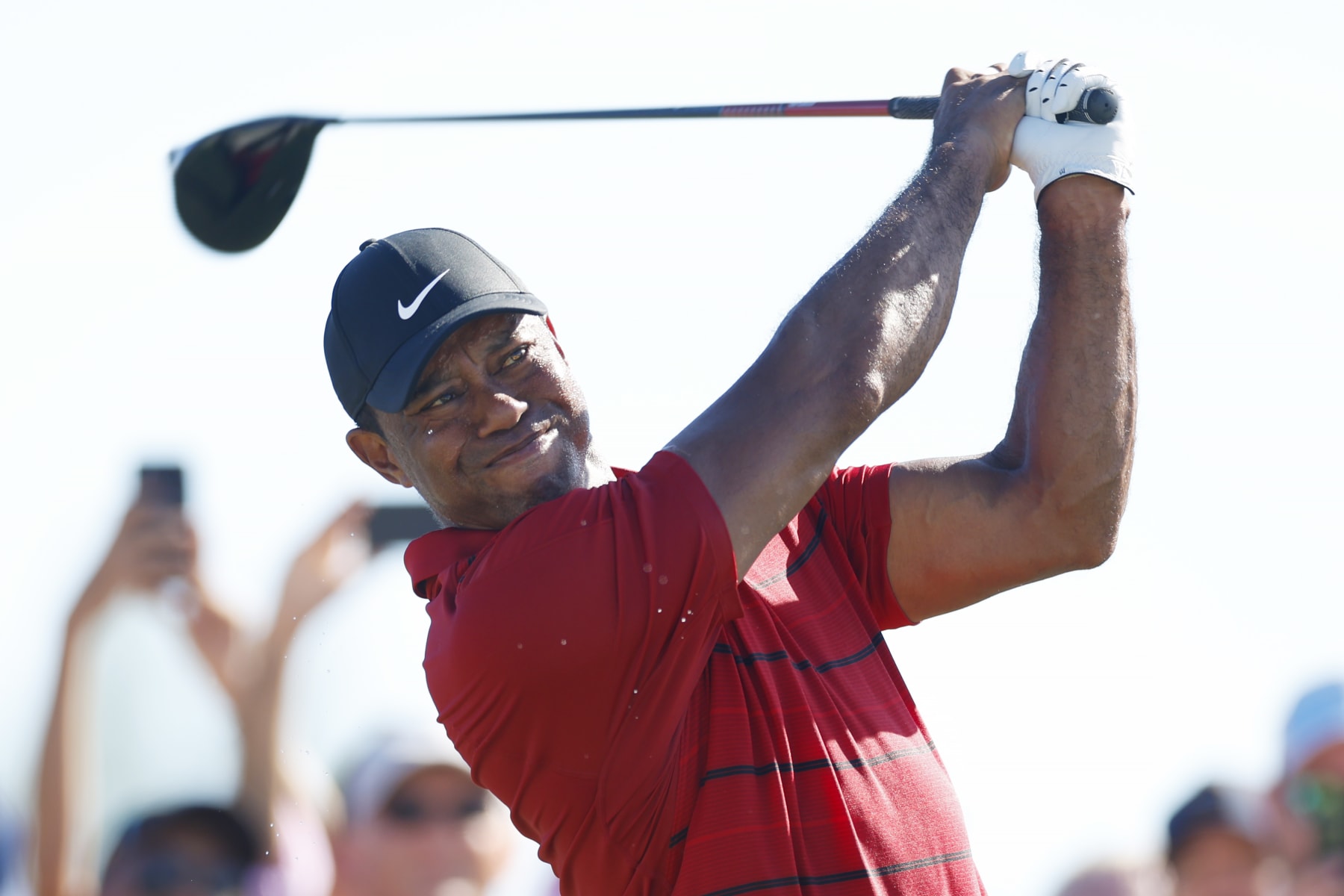 NASSAU, BAHAMAS - DECEMBER 03:  Tiger Woods of the United States plays his shot from the 15th tee during the final round of the Hero World Challenge at Albany Golf Course on December 03, 2023 in Nassau, Bahamas. (Photo by Mike Ehrmann/Getty Images)