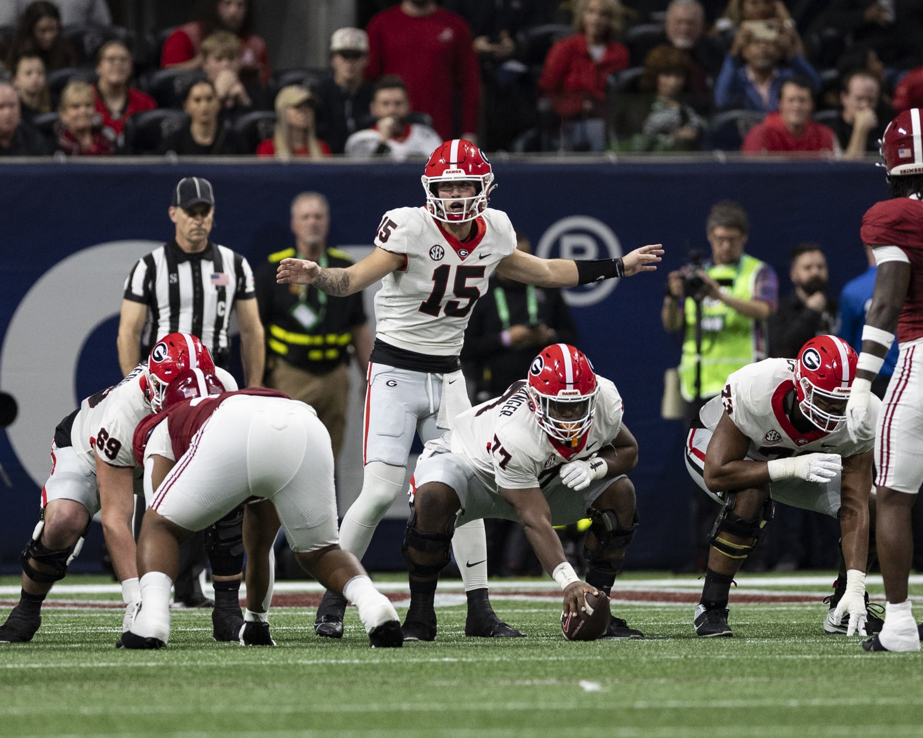 ATLANTA, GEORGIA - DECEMBER 2: Carson Beck #15 of the Georgia Bulldogs calls an audible during a game between University of Georgia and University of Alabama at Mercedes-Benz Stadium on December 2, 2023 in Atlanta, Georgia. (Photo by Steve Limentani/ISI Photos/Getty Images)