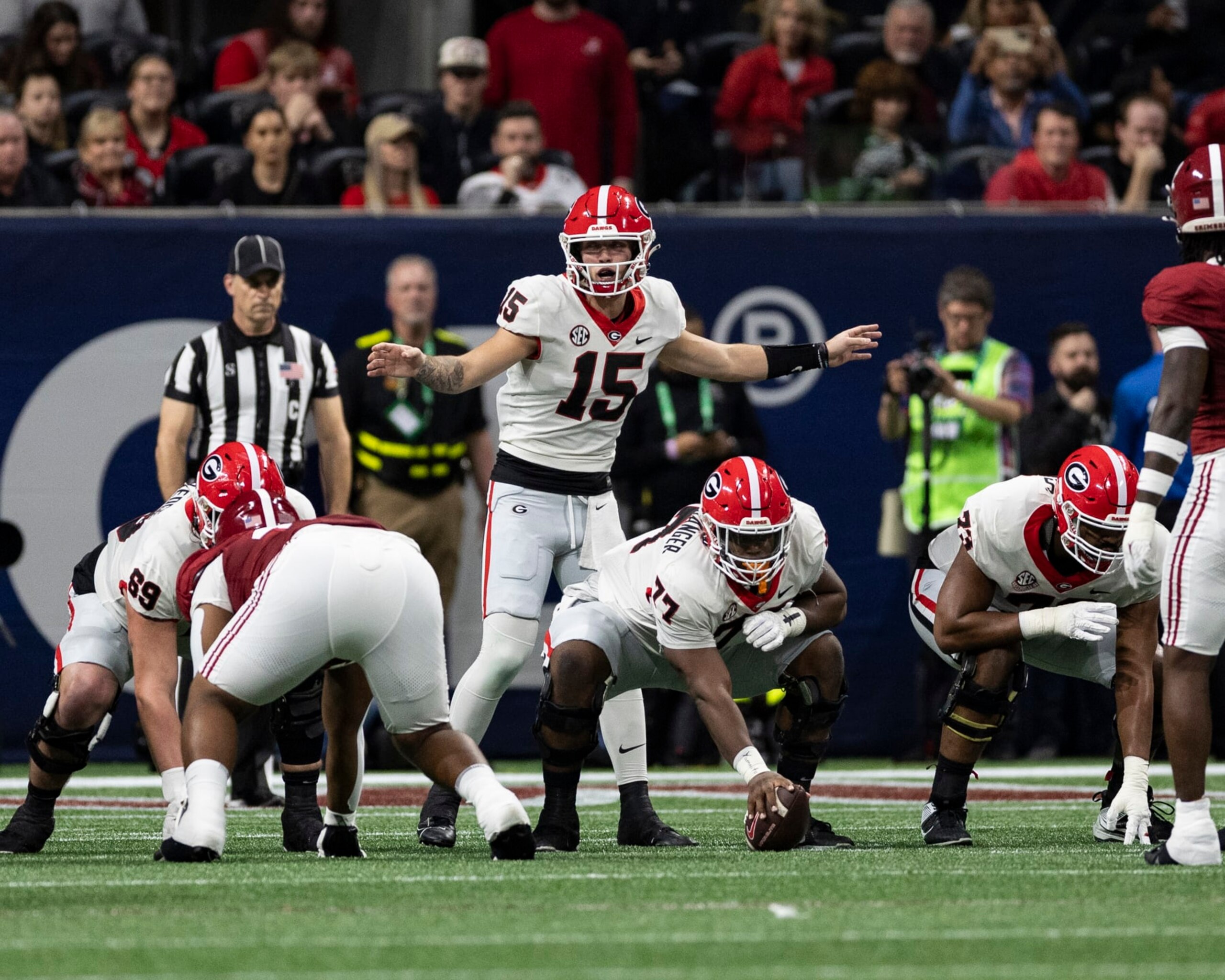 ATLANTA, GEORGIA - DECEMBER 2: Carson Beck #15 of the Georgia Bulldogs calls an audible during a game between University of Georgia and University of Alabama at Mercedes-Benz Stadium on December 2, 2023 in Atlanta, Georgia. (Photo by Steve Limentani/ISI Photos/Getty Images)