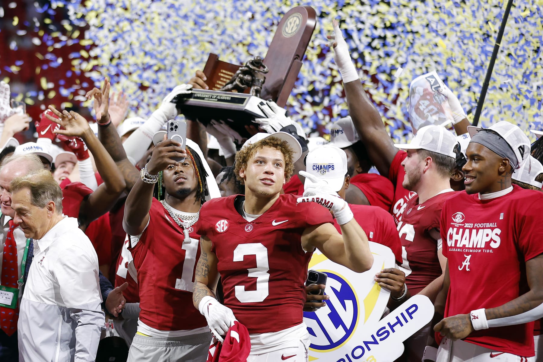 ATLANTA, GEORGIA - DECEMBER 02: Kool-Aid McKinstry #1, Jermaine Burton #3 and the Alabama Crimson Tide celebrate after defeating the Georgia Bulldogs 27-24 in the SEC Championship at Mercedes-Benz Stadium on December 02, 2023 in Atlanta, Georgia. (Photo by Todd Kirkland/Getty Images)