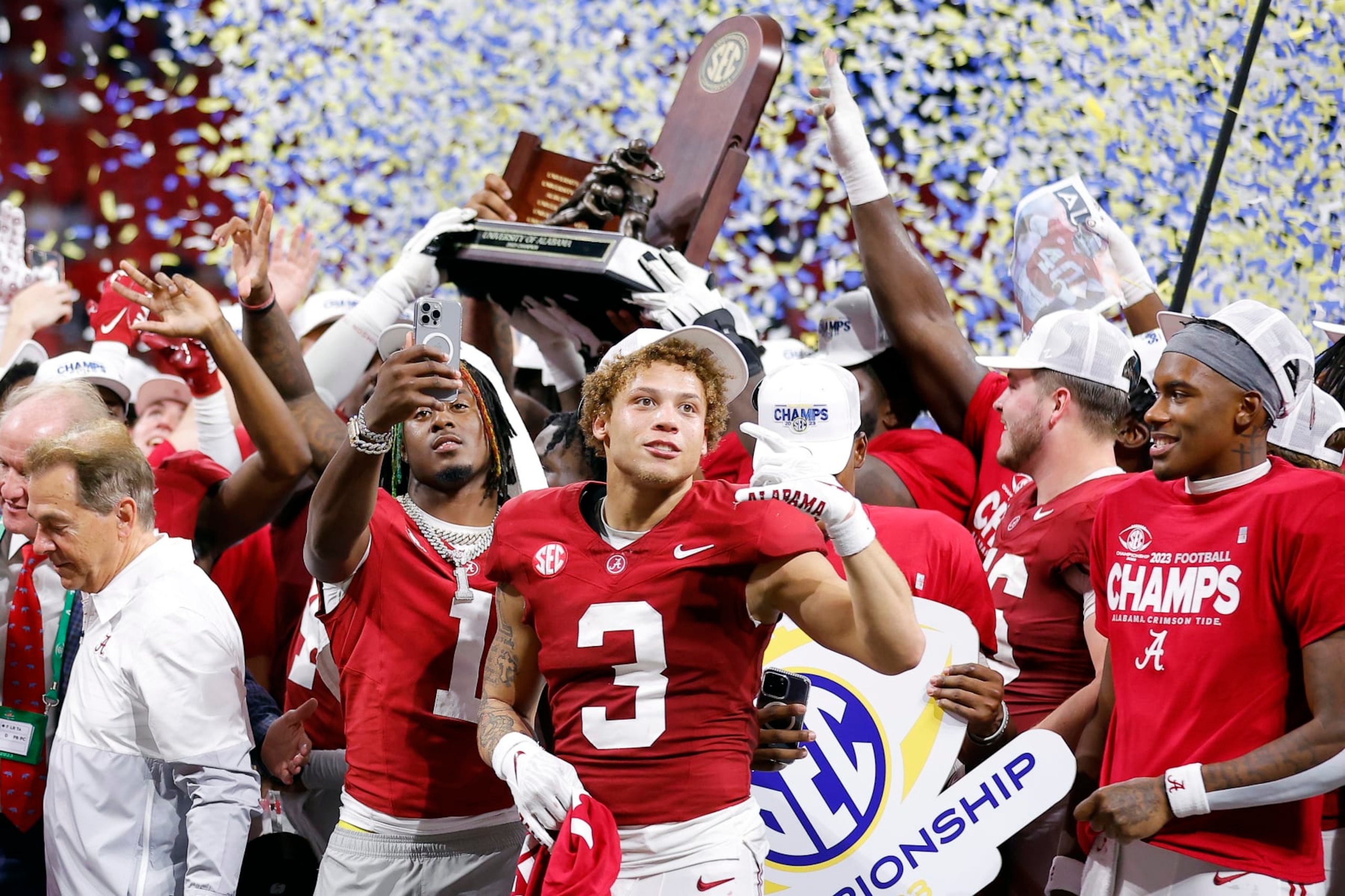 ATLANTA, GEORGIA - DECEMBER 02: Kool-Aid McKinstry #1, Jermaine Burton #3 and the Alabama Crimson Tide celebrate after defeating the Georgia Bulldogs 27-24 in the SEC Championship at Mercedes-Benz Stadium on December 02, 2023 in Atlanta, Georgia. (Photo by Todd Kirkland/Getty Images)