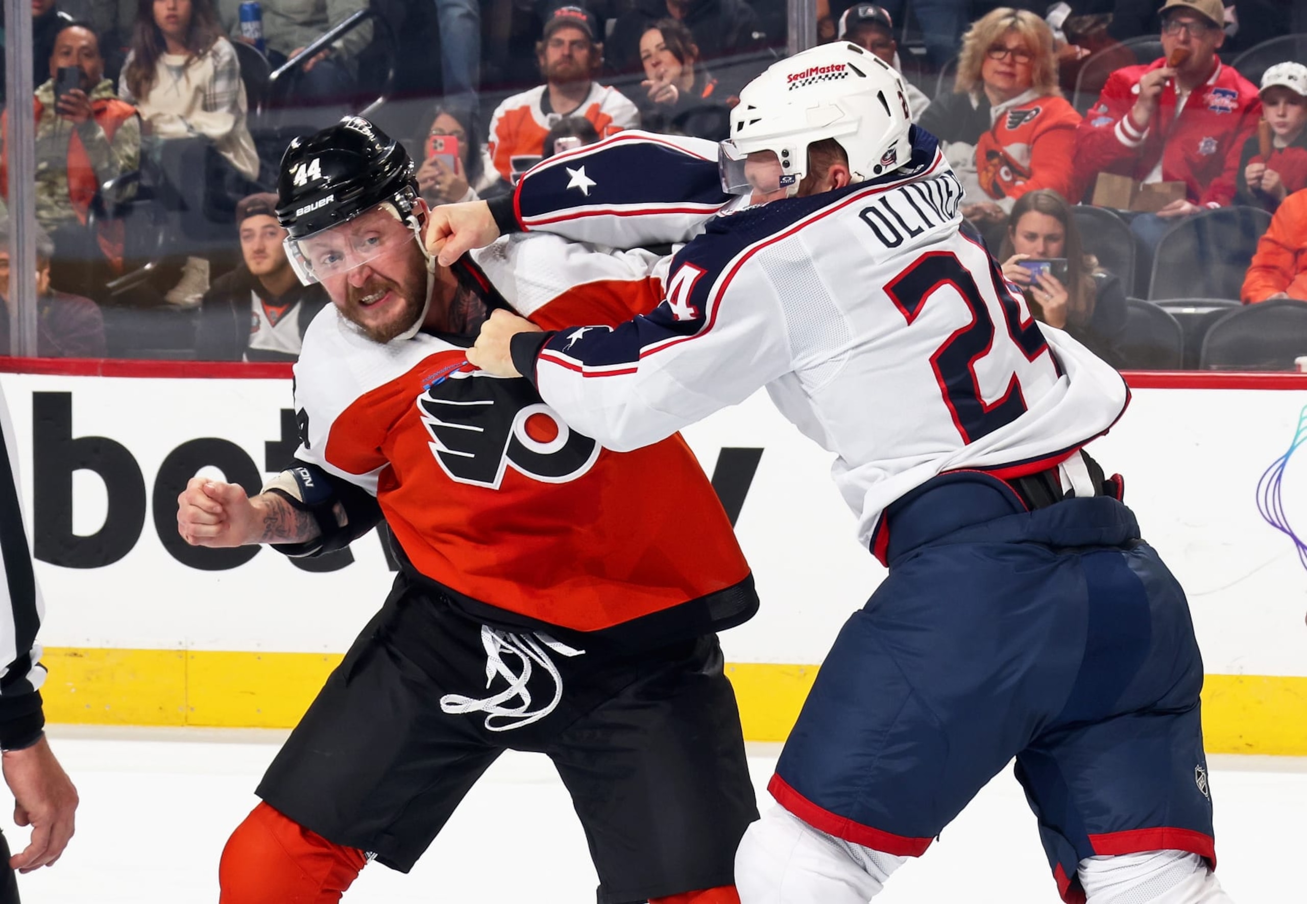 PHILADELPHIA, PENNSYLVANIA - NOVEMBER 19: Nicolas Deslauriers #44 of the Philadelphia Flyers fights Mathieu Olivier #24 of the Columbus Blue Jackets during the first period at the Wells Fargo Center on November 19, 2023 in Philadelphia, Pennsylvania.  (Photo by Len Redkoles/NHLI via Getty Images)