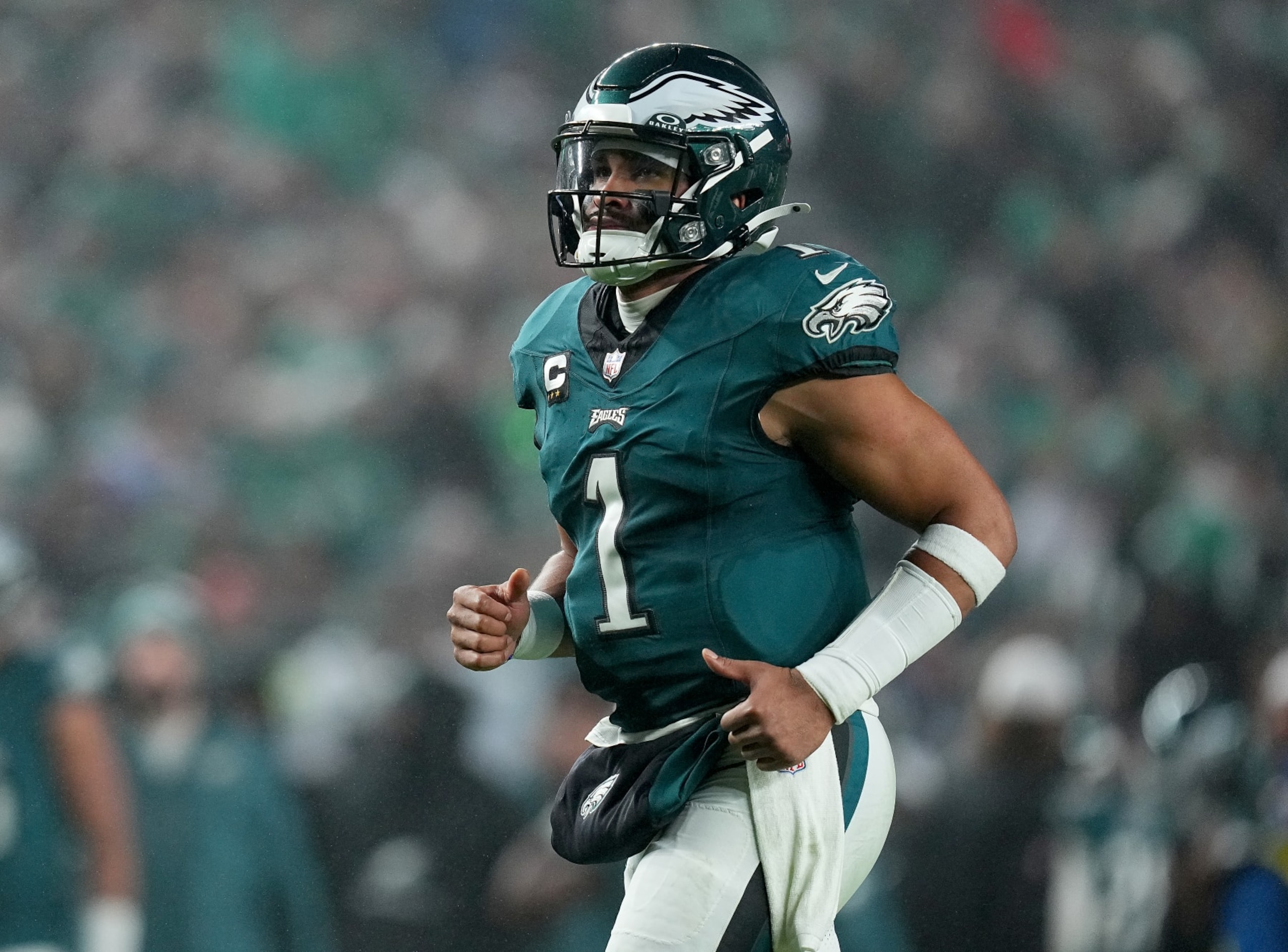 PHILADELPHIA, PENNSYLVANIA - DECEMBER 03: Jalen Hurts #1 of the Philadelphia Eagles runs off the field at halftime in the game against the San Francisco 49ers at Lincoln Financial Field on December 03, 2023 in Philadelphia, Pennsylvania. (Photo by Mitchell Leff/Getty Images)