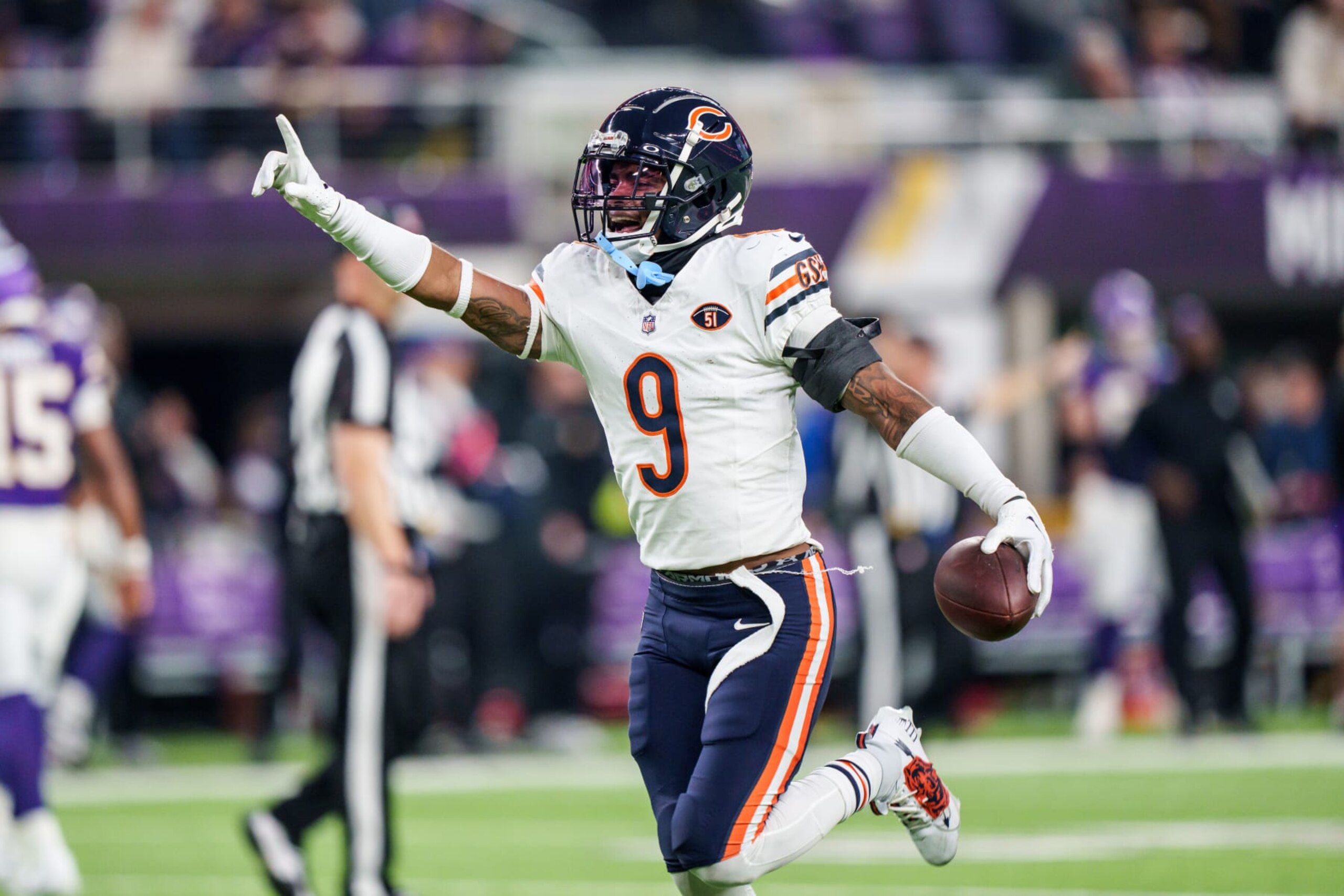 MINNEAPOLIS, MN - NOVEMBER 27:  Safety Jaquan Brisker #9 of the Chicago Bears runs the ball following an interception during an NFL football game against the Chicago Bears at US Bank Stadium on November 27, 2023 in Minneapolis, Minnesota. The Bears beat the Vikings 12-10. (Photo by Todd Rosenberg/Getty Images)