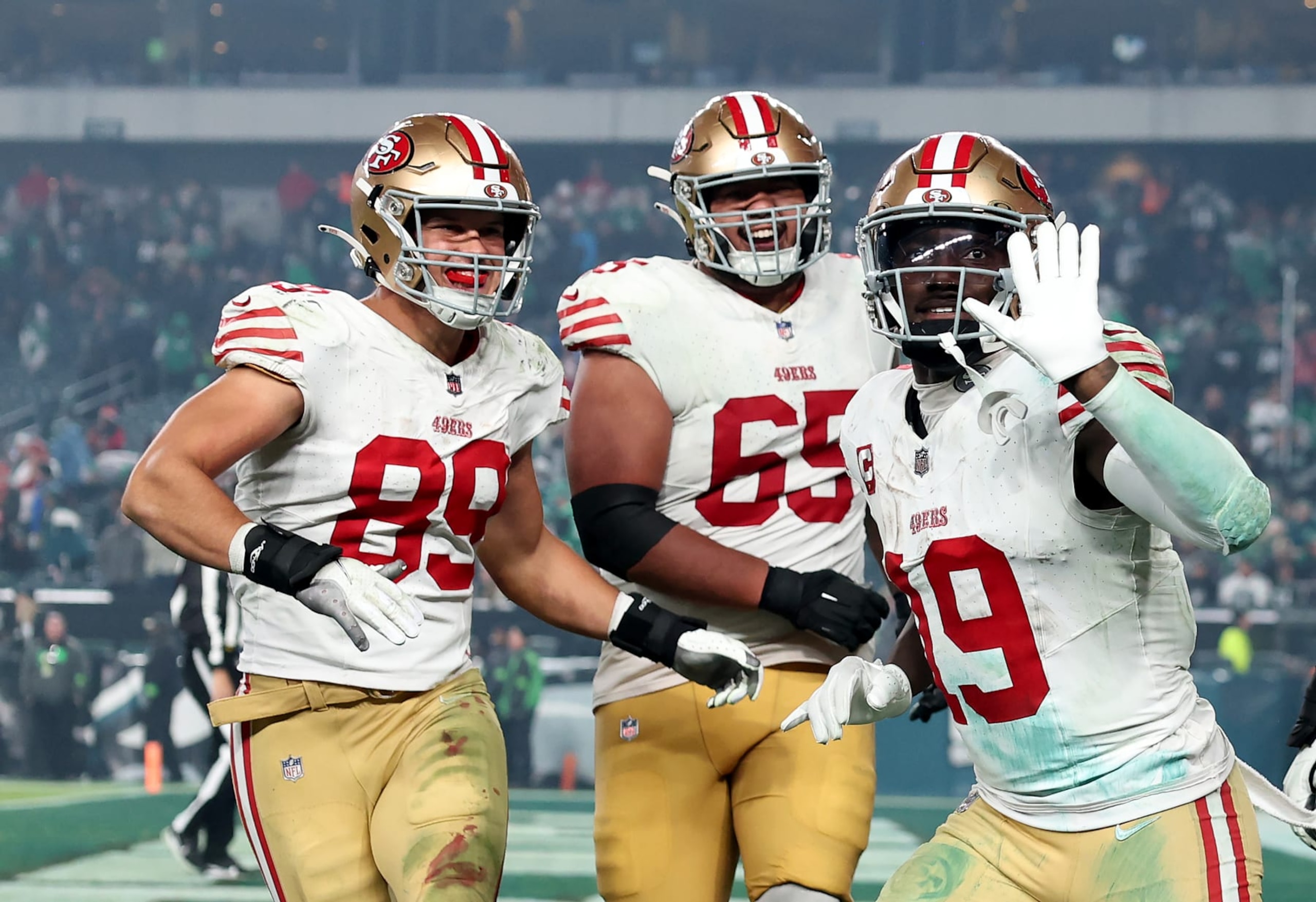 PHILADELPHIA, PENNSYLVANIA - DECEMBER 03: Deebo Samuel #19 of the San Francisco 49ers celebrates after a touchdown with Charlie Woerner #89 and Aaron Banks #65 during the fourth quarter in the game against the Philadelphia Eagles at Lincoln Financial Field on December 03, 2023 in Philadelphia, Pennsylvania. (Photo by Tim Nwachukwu/Getty Images) PHILADELPHIA, PENNSYLVANIA - DECEMBER 03: Deebo Samuel #19 of the San Francisco 49ers celebrates after a touchdown with Charlie Woerner #89 and Aaron Banks #65 during the fourth quarter in the game against the Philadelphia Eagles at Lincoln Financial Field on December 03, 2023 in Philadelphia, Pennsylvania. (Photo by Tim Nwachukwu/Getty Images)