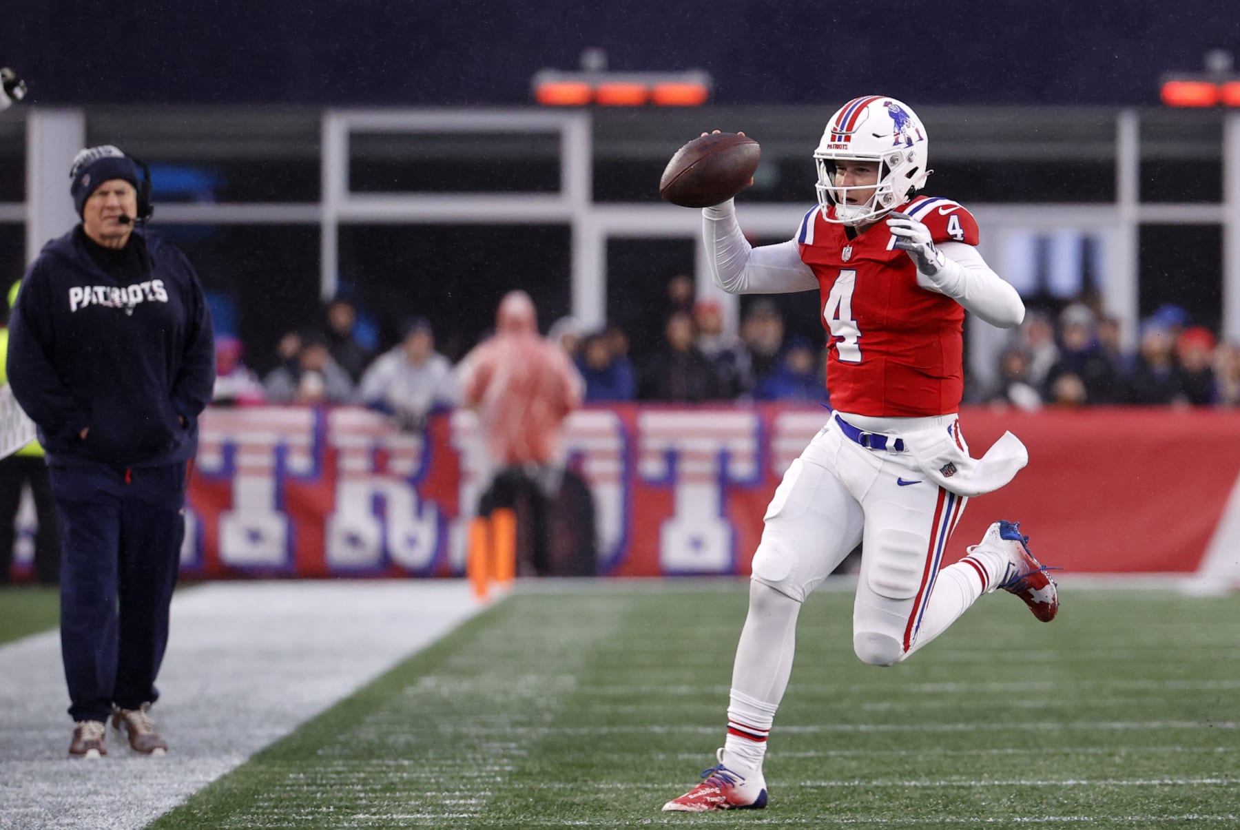 FOXBOROUGH, MA - DECEMBER 03: New England Patriots quarterback Bailey Zappe (4) gets to the sideline during a game between the New England Patriots and the Los Angeles Chargers on December 3, 2023, at Gillette Stadium in Foxborough, Massachusetts. (Photo by Fred Kfoury III/Icon Sportswire via Getty Images)