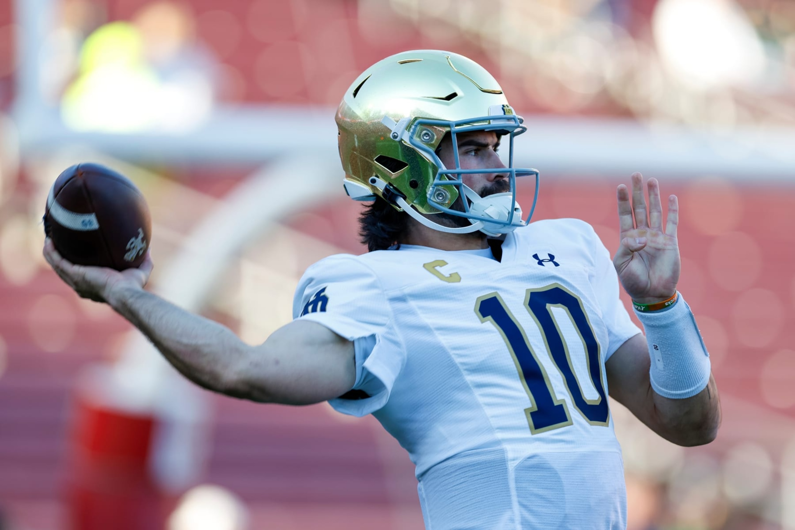 STANFORD, CALIFORNIA - NOVEMBER 25: Sam Hartman #10 of the Notre Dame Fighting Irish warms up prior to a game against the Stanford Cardinal at Stanford Stadium on November 25, 2023 in Stanford, California. (Photo by Brandon Sloter/Image Of Sport/Getty Images)