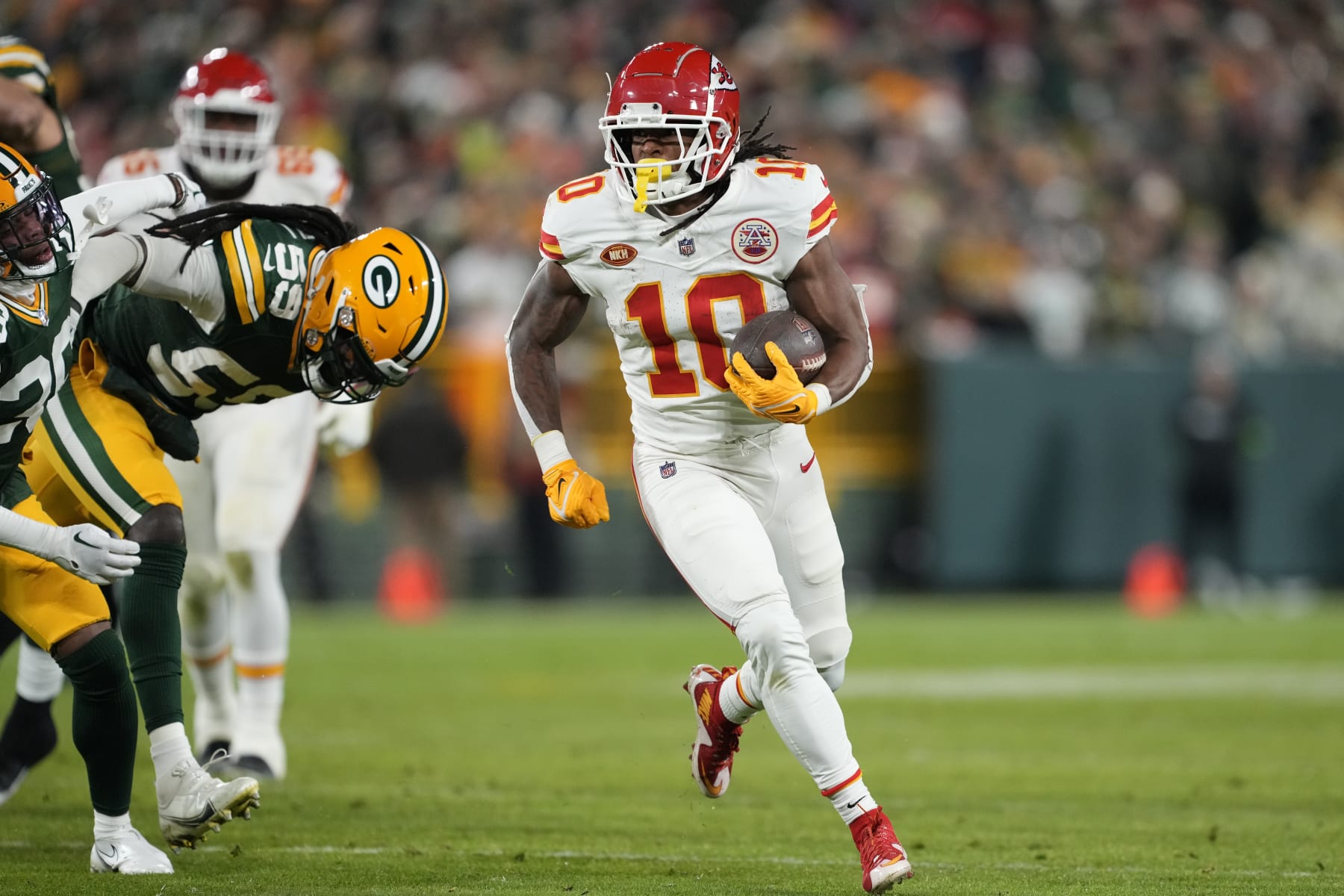 GREEN BAY, WISCONSIN - DECEMBER 03: Isiah Pacheco #10 of the Kansas City Chiefs runs with the ball during the first half against the Green Bay Packers at Lambeau Field on December 03, 2023 in Green Bay, Wisconsin. (Photo by Patrick McDermott/Getty Images)