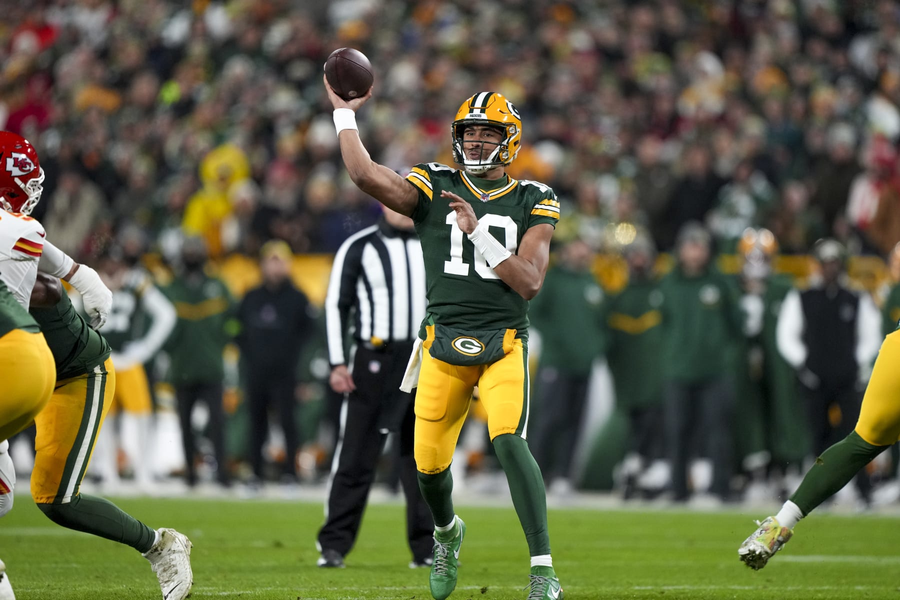 GREEN BAY, WI - DECEMBER 3: Quarterback Jordan Love #10 of the Green Bay Packers throws the ball during an NFL football game against the Kansas City Chiefs at Lambeau Field on December 3, 2023 in Green Bay, Wisconsin. (Photo by Todd Rosenberg/Getty Images)