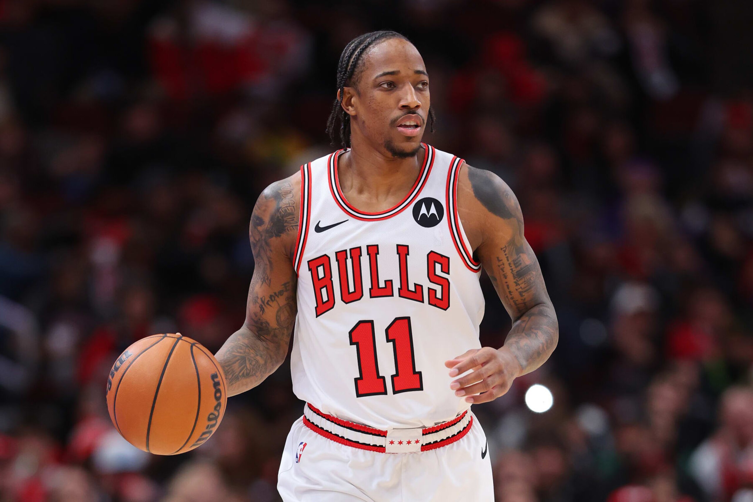 CHICAGO, ILLINOIS - DECEMBER 02: DeMar DeRozan #11 of the Chicago Bulls dribbles up the court against the New Orleans Pelicans during the first half at the United Center on December 02, 2023 in Chicago, Illinois. NOTE TO USER: User expressly acknowledges and agrees that, by downloading and or using this photograph, User is consenting to the terms and conditions of the Getty Images License Agreement. (Photo by Michael Reaves/Getty Images) CHICAGO, ILLINOIS - DECEMBER 02: DeMar DeRozan #11 of the Chicago Bulls dribbles up the court against the New Orleans Pelicans during the first half at the United Center on December 02, 2023 in Chicago, Illinois. NOTE TO USER: User expressly acknowledges and agrees that, by downloading and or using this photograph, User is consenting to the terms and conditions of the Getty Images License Agreement. (Photo by Michael Reaves/Getty Images)