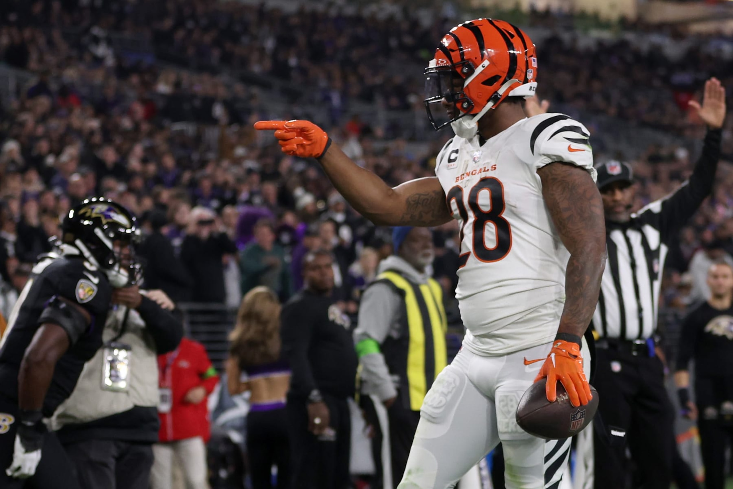 BALTIMORE, MARYLAND - NOVEMBER 16: Joe Mixon #28 of the Cincinnati Bengals celebrates after scoring a touchdown against the Baltimore Ravens during the second quarter of the game at M&T Bank Stadium on November 16, 2023 in Baltimore, Maryland. (Photo by Patrick Smith/Getty Images)