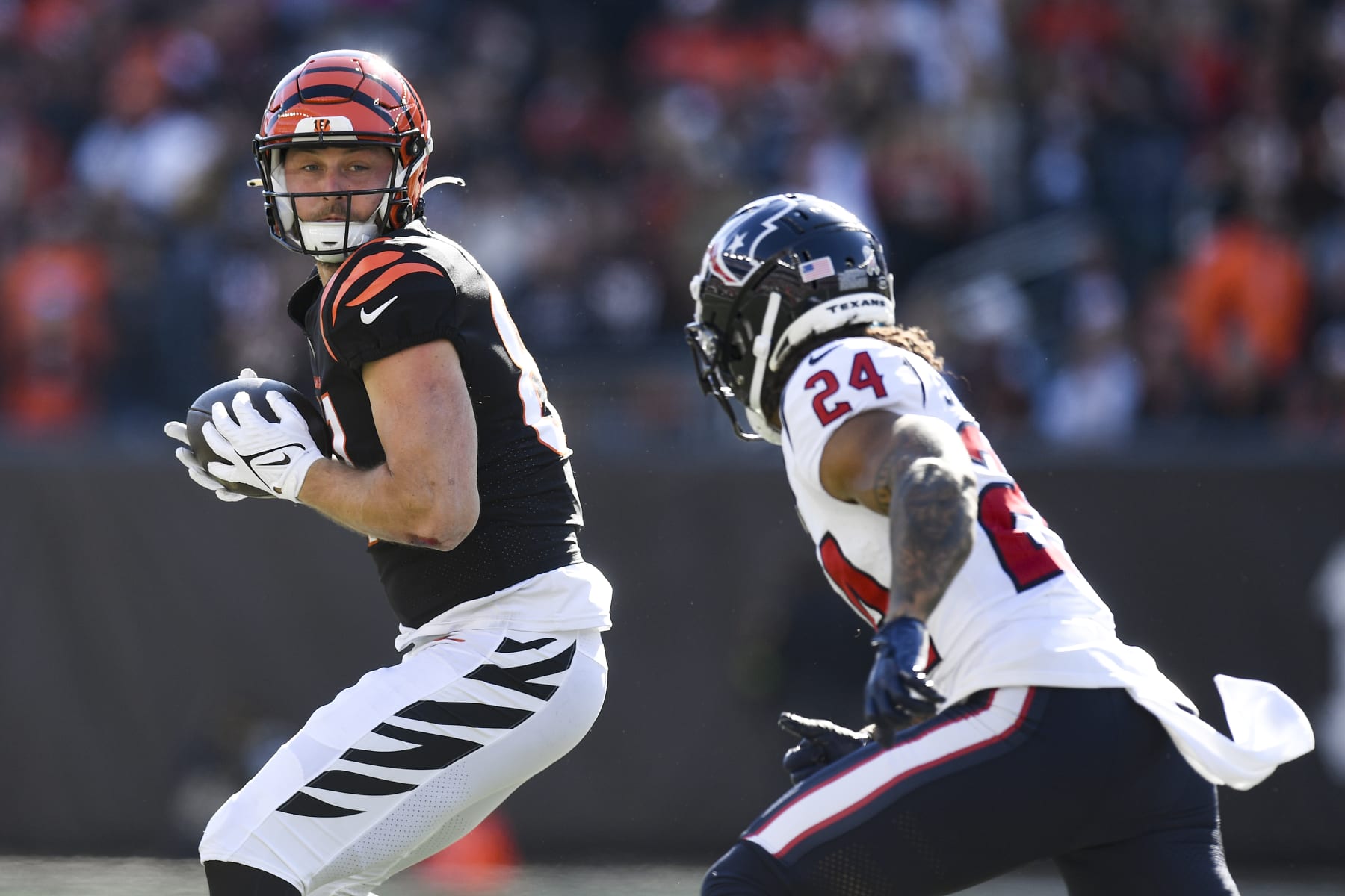 CINCINNATI, OH - NOVEMBER 12: Cincinnati Bengals Tight End Tanner Hudson (87) catches as Houston Texans Cornerback Derek Stingley Jr. (24) defends during the NFL football game between the Houston Texans and the Cincinnati Bengals on November 12, 2023, at Paycor Stadium in Cincinnati, Ohio. (Photo by Michael Allio/Icon Sportswire via Getty Images)