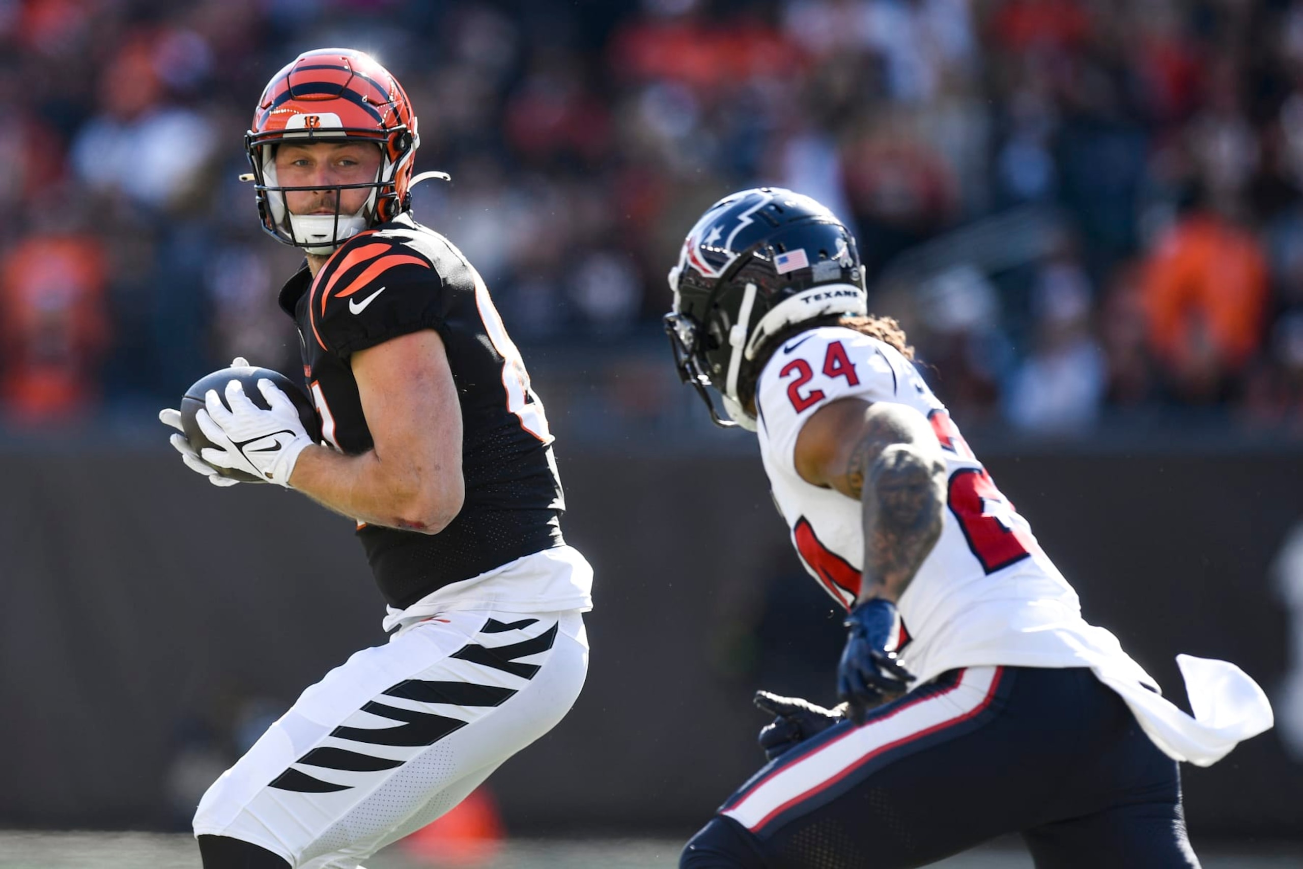 CINCINNATI, OH - NOVEMBER 12: Cincinnati Bengals Tight End Tanner Hudson (87) catches as Houston Texans Cornerback Derek Stingley Jr. (24) defends during the NFL football game between the Houston Texans and the Cincinnati Bengals on November 12, 2023, at Paycor Stadium in Cincinnati, Ohio. (Photo by Michael Allio/Icon Sportswire via Getty Images)