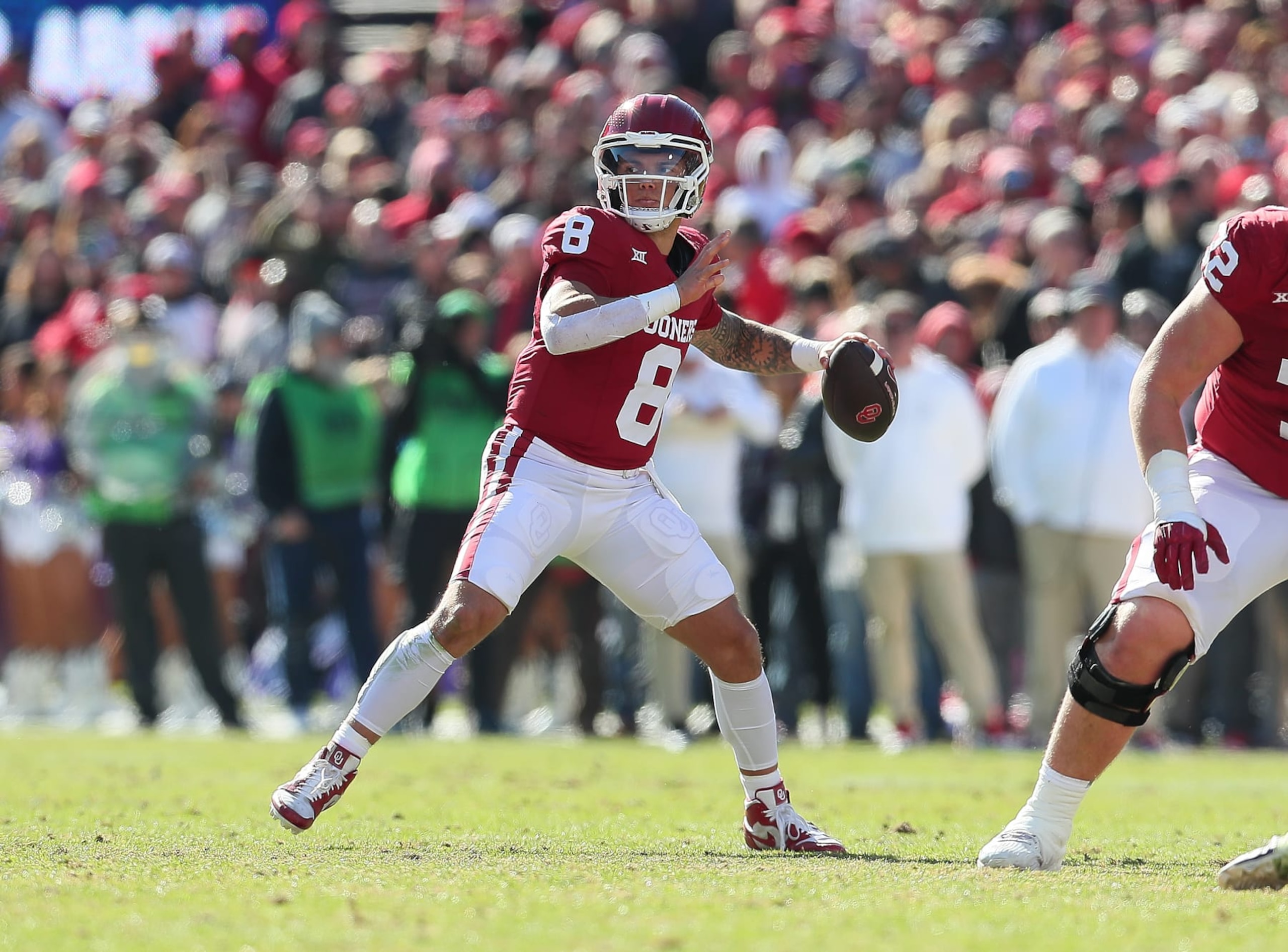 NORMAN, OK - NOVEMBER 24: Oklahoma Sooners QB  Dillon Gabriel (08) eyes an open receiver during a game between the Oklahoma Sooners and the Texas Christian Horned Frogs at Gaylord Memorial Stadium in Norman, Oklahoma on November 24, 2023. (Photo by David Stacy/Icon Sportswire via Getty Images)