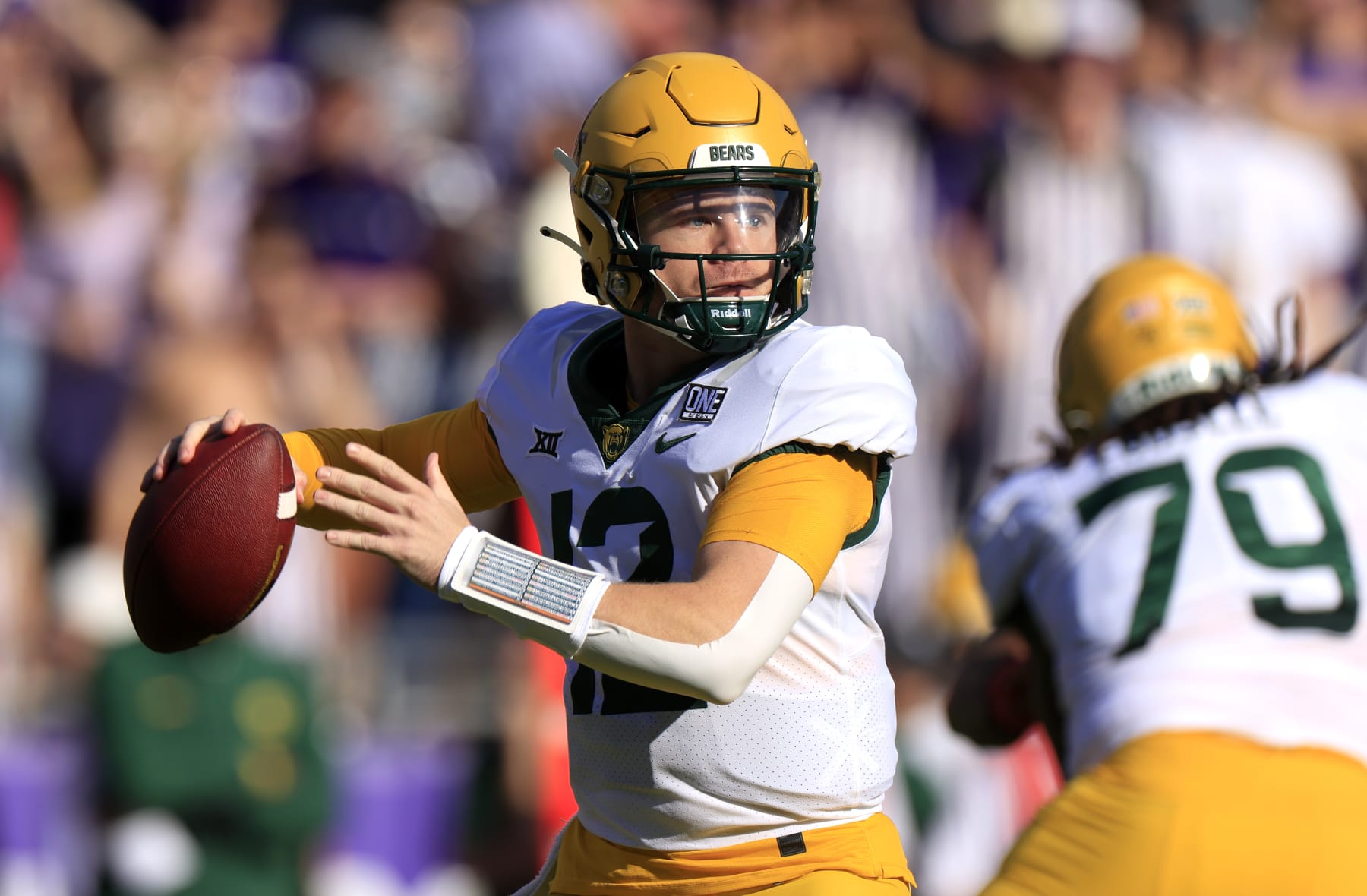 FORT WORTH, TX - NOVEMBER 18: Blake Shapen #12 of the Baylor Bears looks to throw against the TCU Horned Frogs during the first half at Amon G. Carter Stadium on November 18, 2023 in Fort Worth, Texas. (Photo by Ron Jenkins/Getty Images)