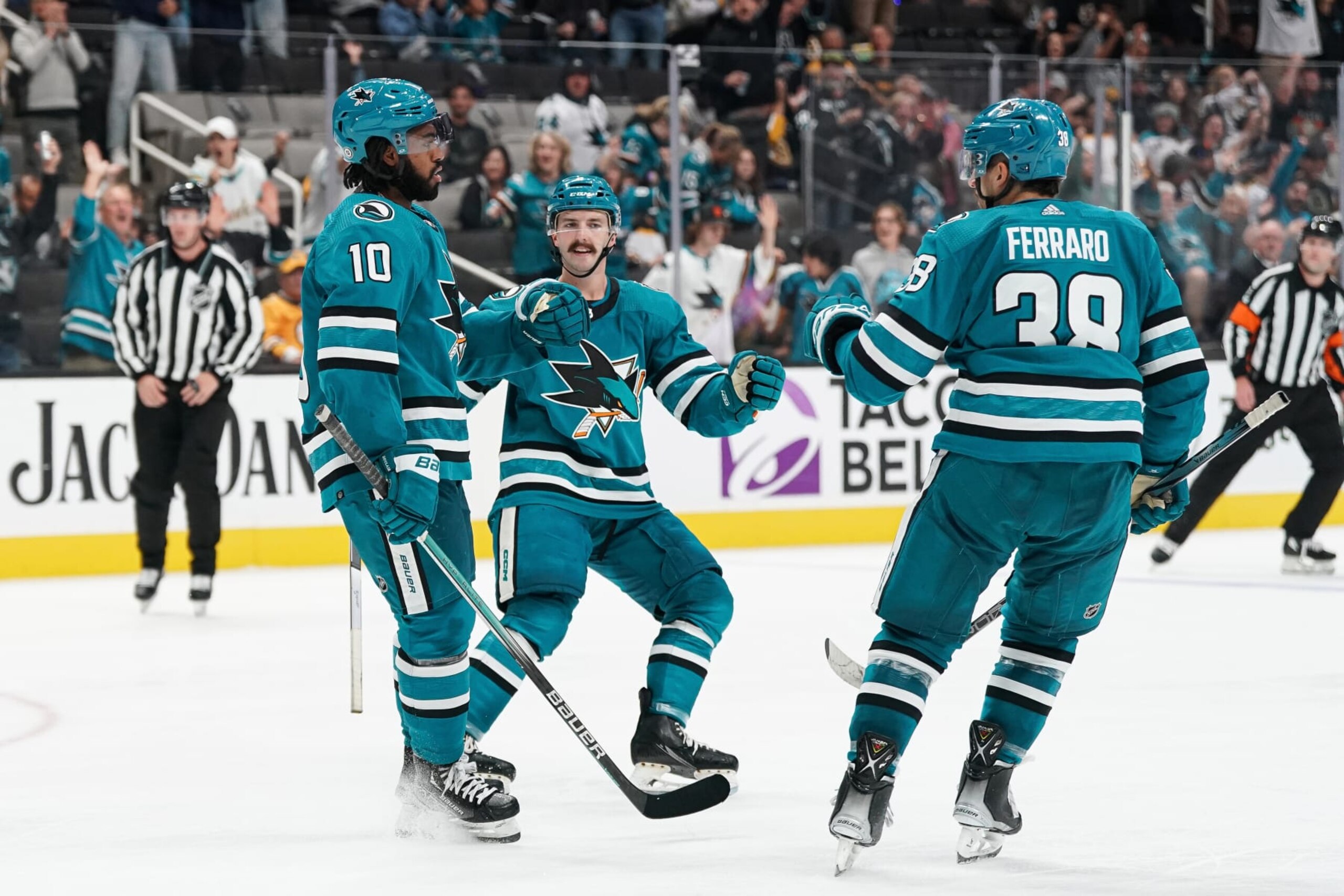 SAN JOSE, CA - OCTOBER 19: Anthony Duclair #10, Mario Ferraro #38 and Kyle Burroughs #4 of the San Jose Sharks celebrate scoring a goal in the third period against the Boston Bruins at SAP Center on October 19, 2023 in San Jose, California. (Photo by Kavin Mistry/NHLI via Getty Images) SAN JOSE, CA - OCTOBER 19: Anthony Duclair #10, Mario Ferraro #38 and Kyle Burroughs #4 of the San Jose Sharks celebrate scoring a goal in the third period against the Boston Bruins at SAP Center on October 19, 2023 in San Jose, California. (Photo by Kavin Mistry/NHLI via Getty Images)